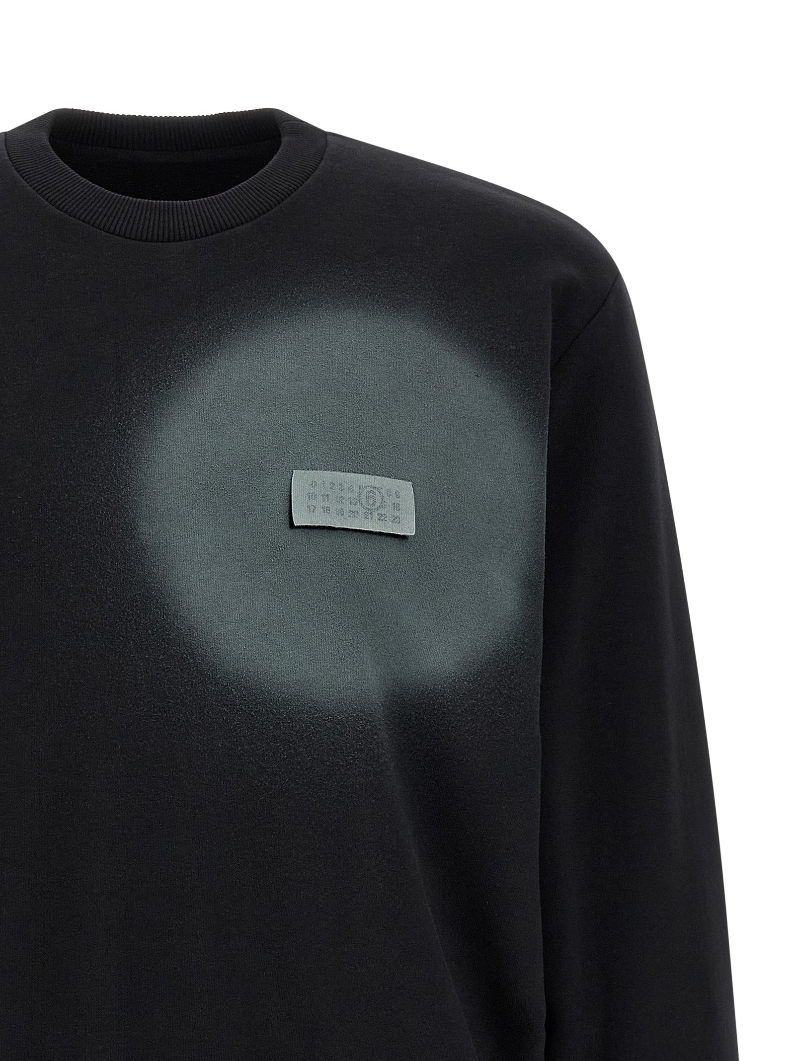 Elevate your wardrobe with the MM6 Maison Margiela Black Cotton Sweatshirt, a luxurious blend of brushed cotton and polyester, crafted for the discerning individual.