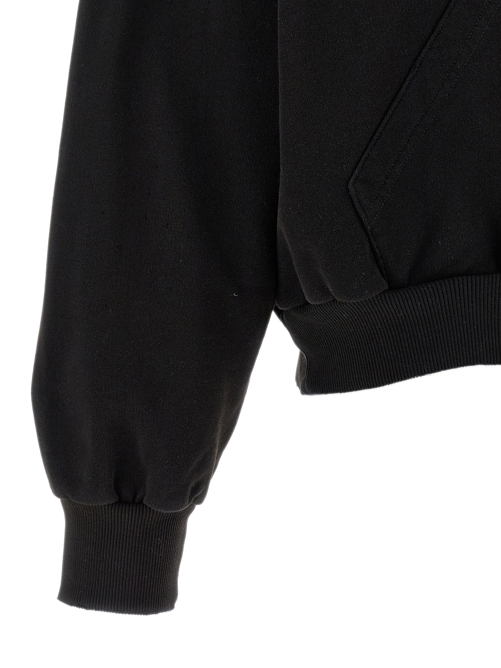 Elevate your style with the MM6 Maison Margiela Black Cotton Sweatshirt, a luxurious blend of artisanal craftsmanship and avant-garde design, perfect for the discerning individual.