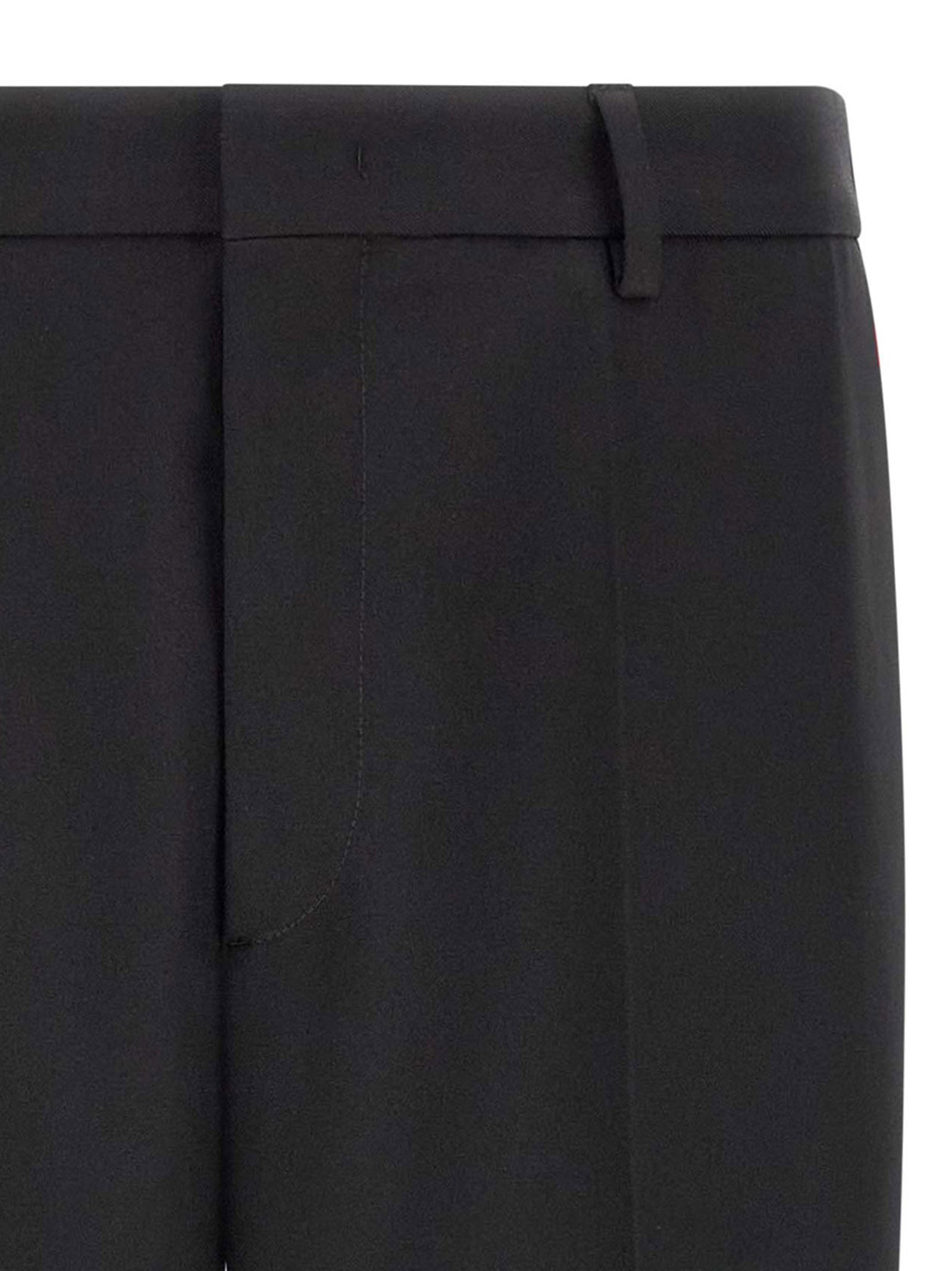 Elevate your wardrobe with Jil Sander's Black Polyester Dress Pants, a blend of couture elegance and modern sophistication, crafted for the discerning individual.