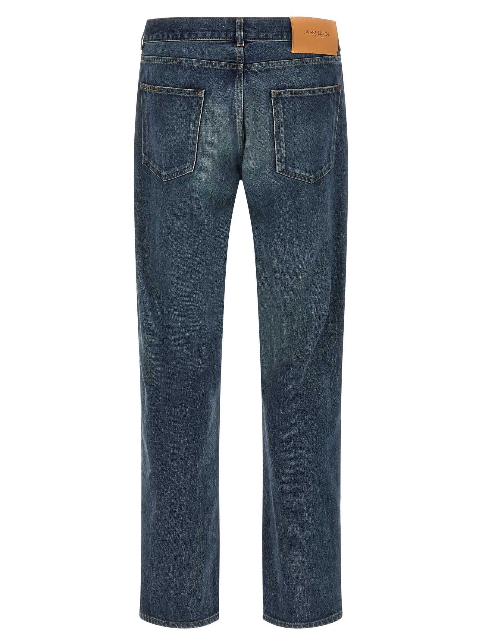 Indulge in the artistry of J.W.Anderson Blue Cotton Straight-Leg Jeans, crafted from premium Japanese denim, embodying luxury and effortless style for the discerning individual.