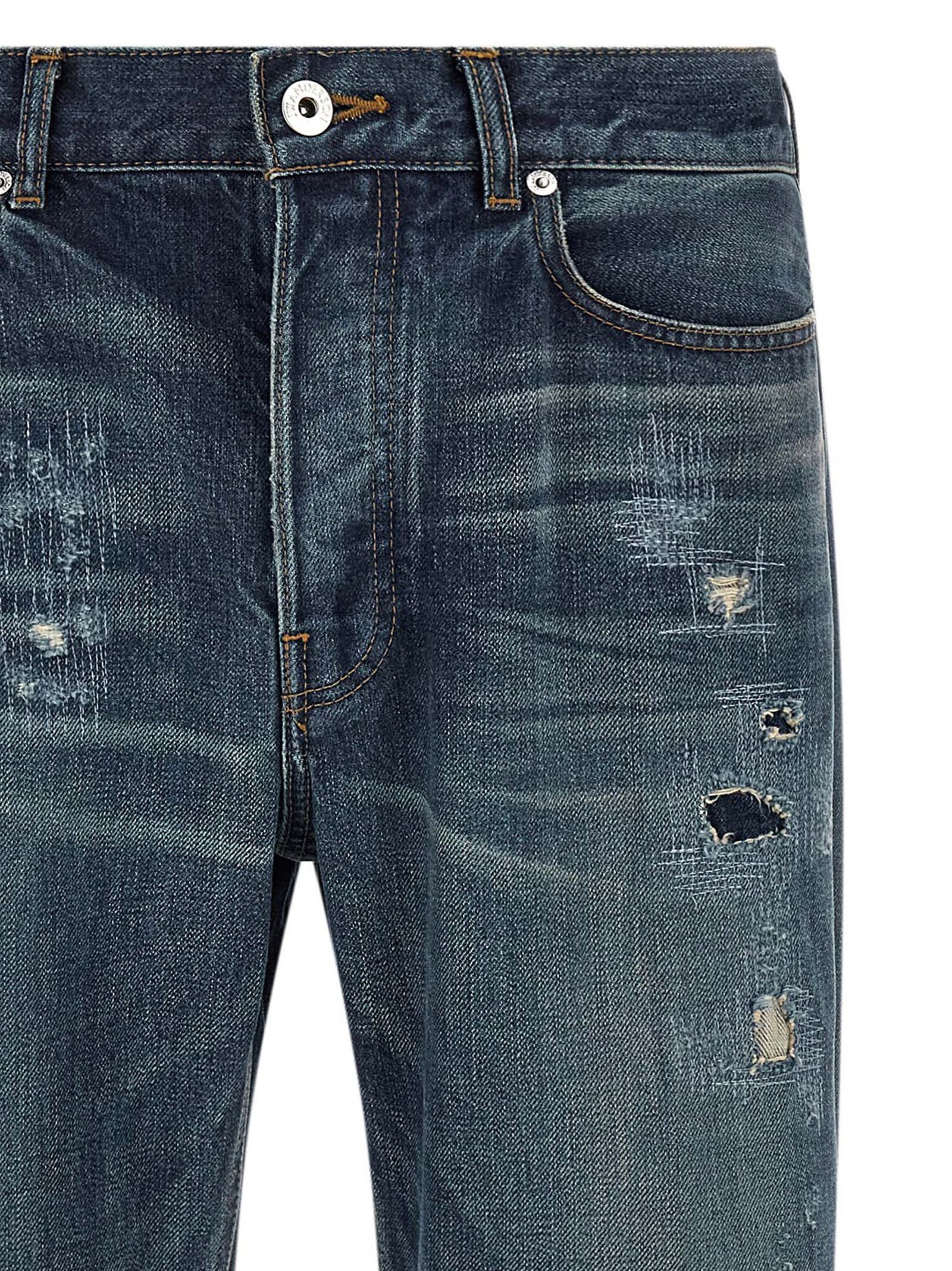 Elevate your wardrobe with J.W.Anderson's Blue Cotton Straight-Leg Jeans, crafted from exquisite Japanese selvedge denim, embodying modern luxury and timeless style.