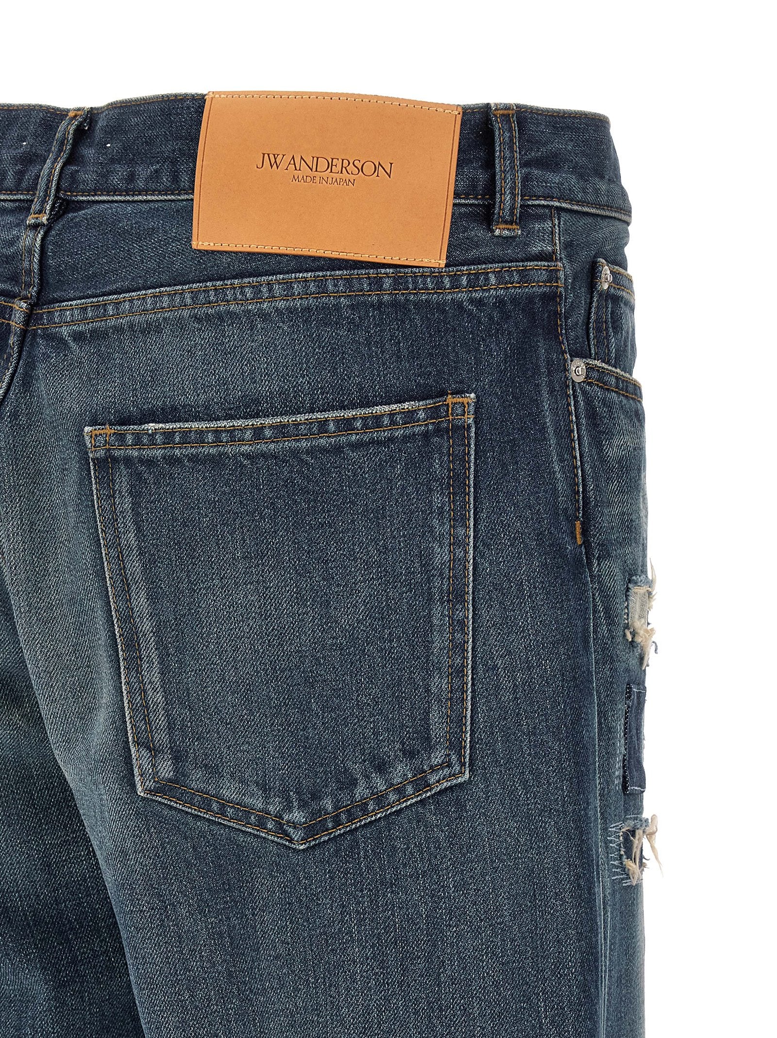 Elevate your wardrobe with J.W.Anderson's Blue Cotton Straight-Leg Jeans, crafted from luxurious Japanese selvedge denim, embodying modern elegance and individuality.