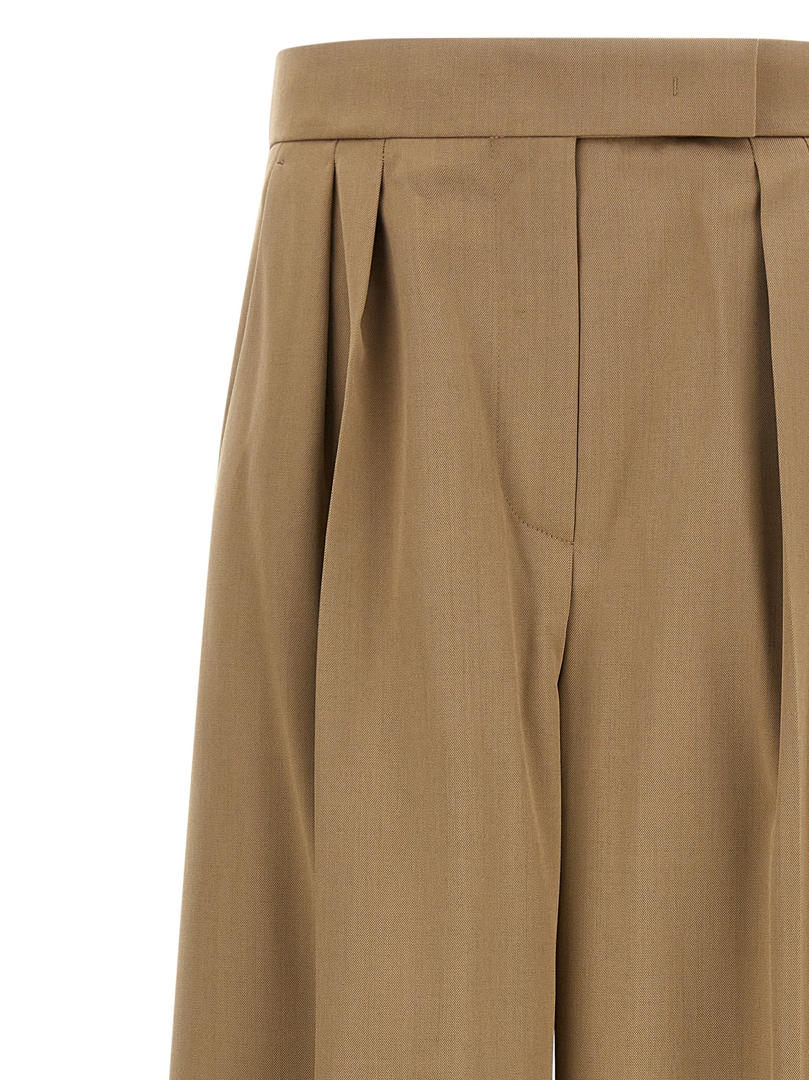 Discover the exquisite Max Mara Brown Virgin Wool Casual Pants, a timeless blend of luxury and sophistication, perfect for elevating any wardrobe with artisanal elegance.