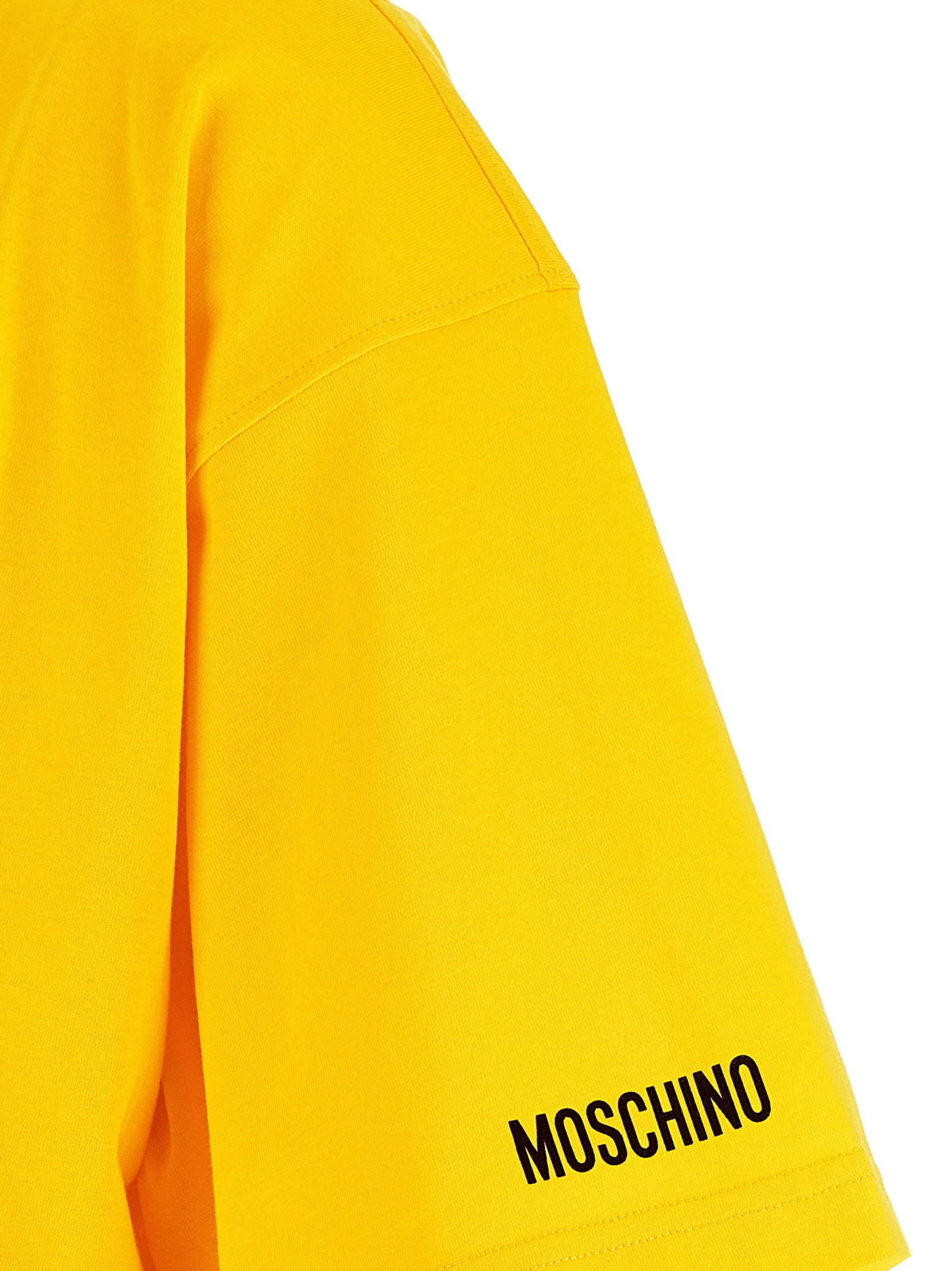 Elevate your style with the Moschino Bicolor Cotton T-Shirt, a luxurious blend of playful design and sustainable elegance, crafted from 100% organic cotton in Portugal.
