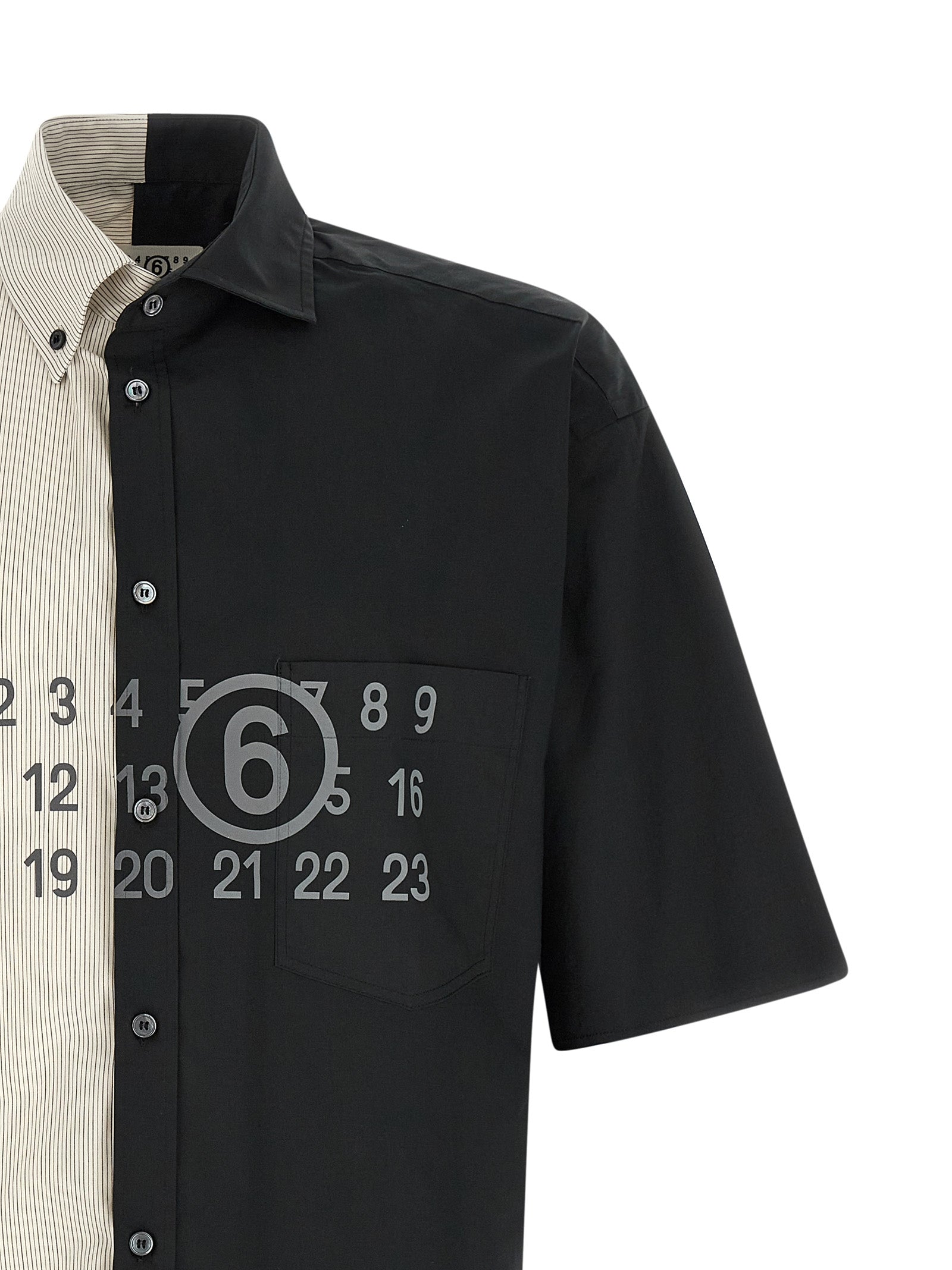 Discover the MM6 Maison Margiela Black Cotton Blouse, a masterpiece of artisanal elegance, featuring exquisite patchwork and luxurious craftsmanship for the discerning individual.