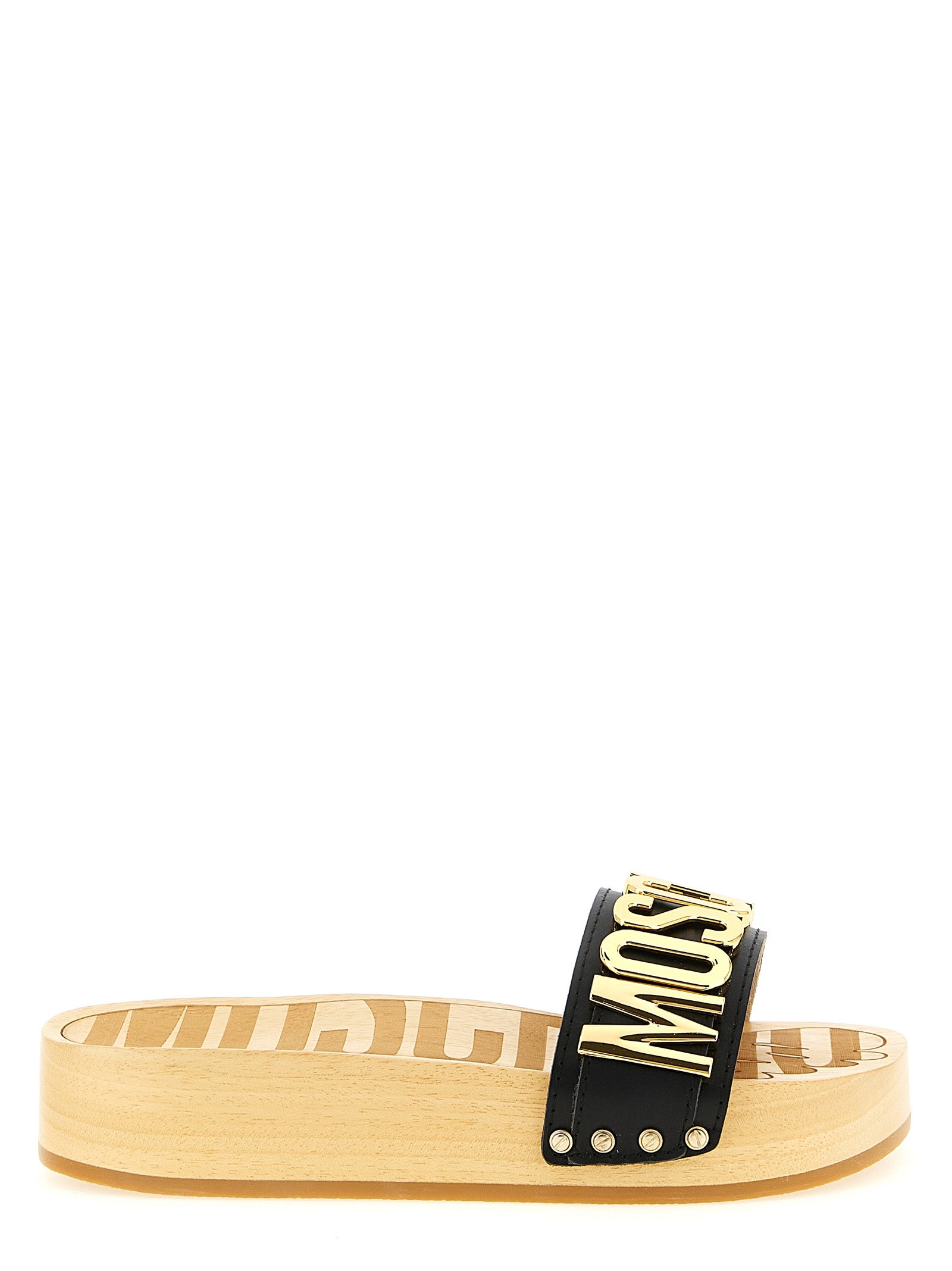 Experience the epitome of luxury with Moschino Black Calfskin Slides, crafted from exquisite calfskin leather, blending elegance and comfort for the discerning individual.