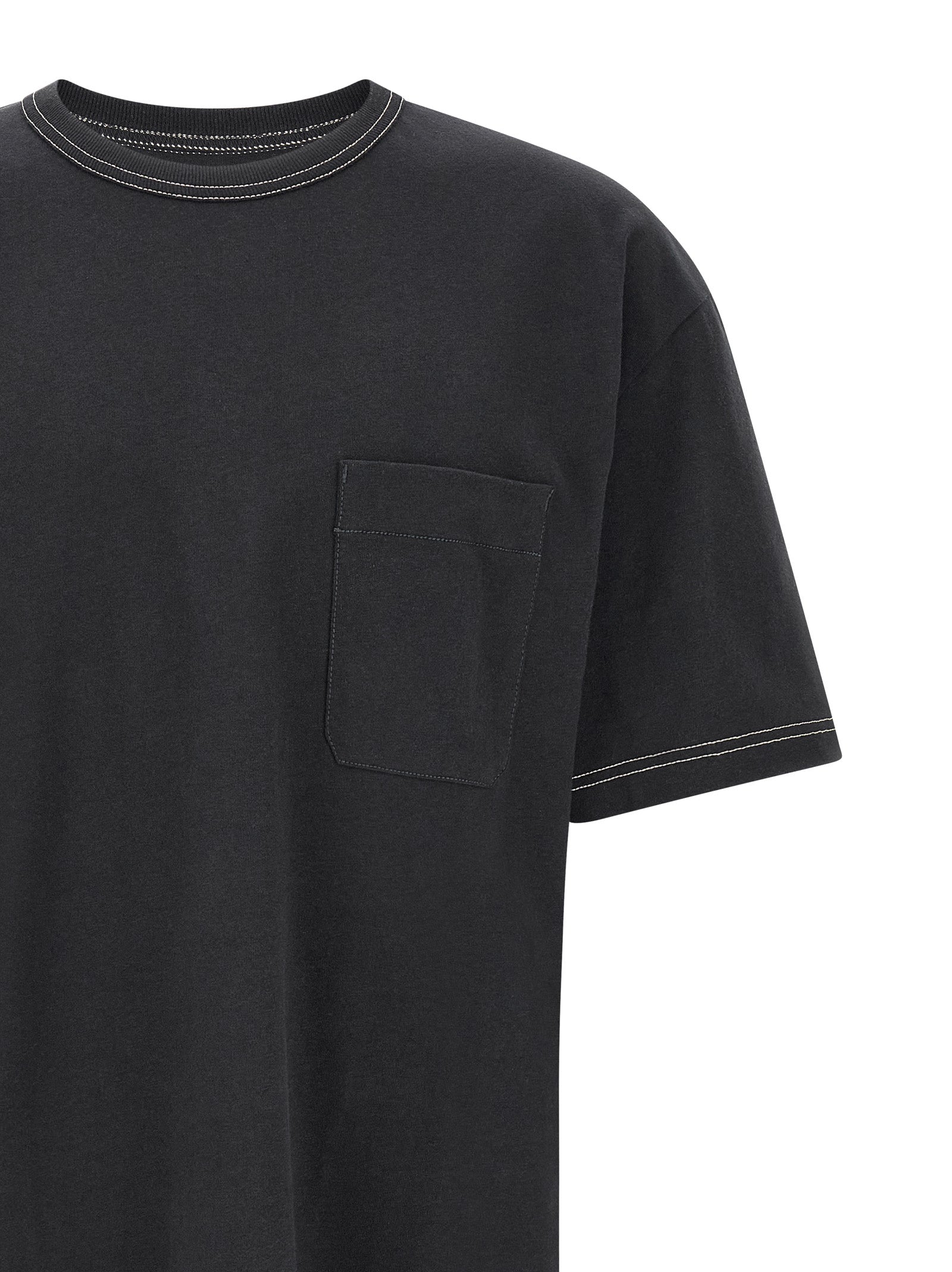 Elevate your wardrobe with the Lemaire Blue Cotton T-Shirt, a luxurious blend of cotton and linen, embodying effortless sophistication and artisanal craftsmanship.