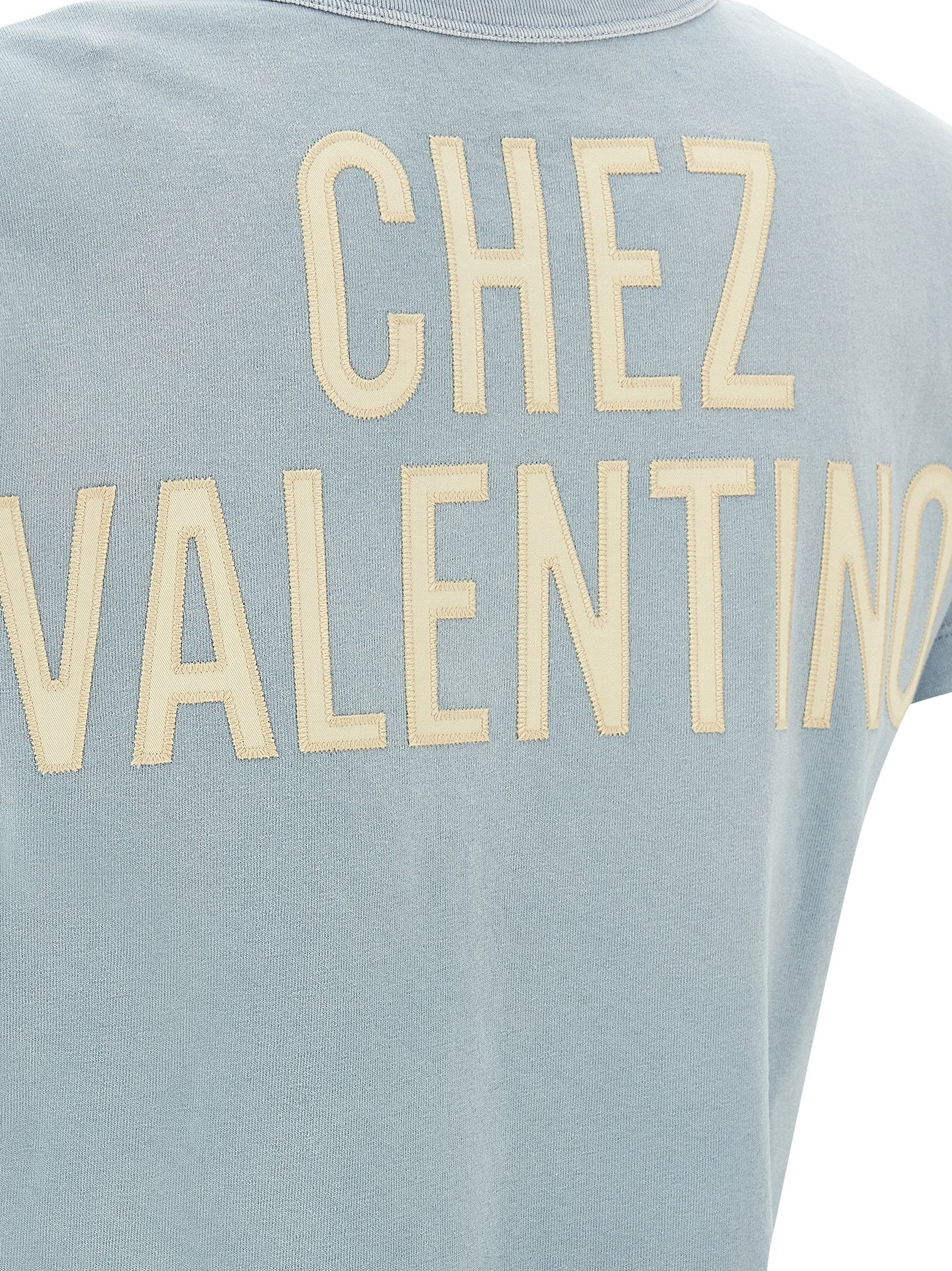 Discover the Valentino Garavani Blue Cotton T-Shirt, a luxurious blend of artistry and elegance, featuring a striking 'Panther Lady' print for the discerning individual.