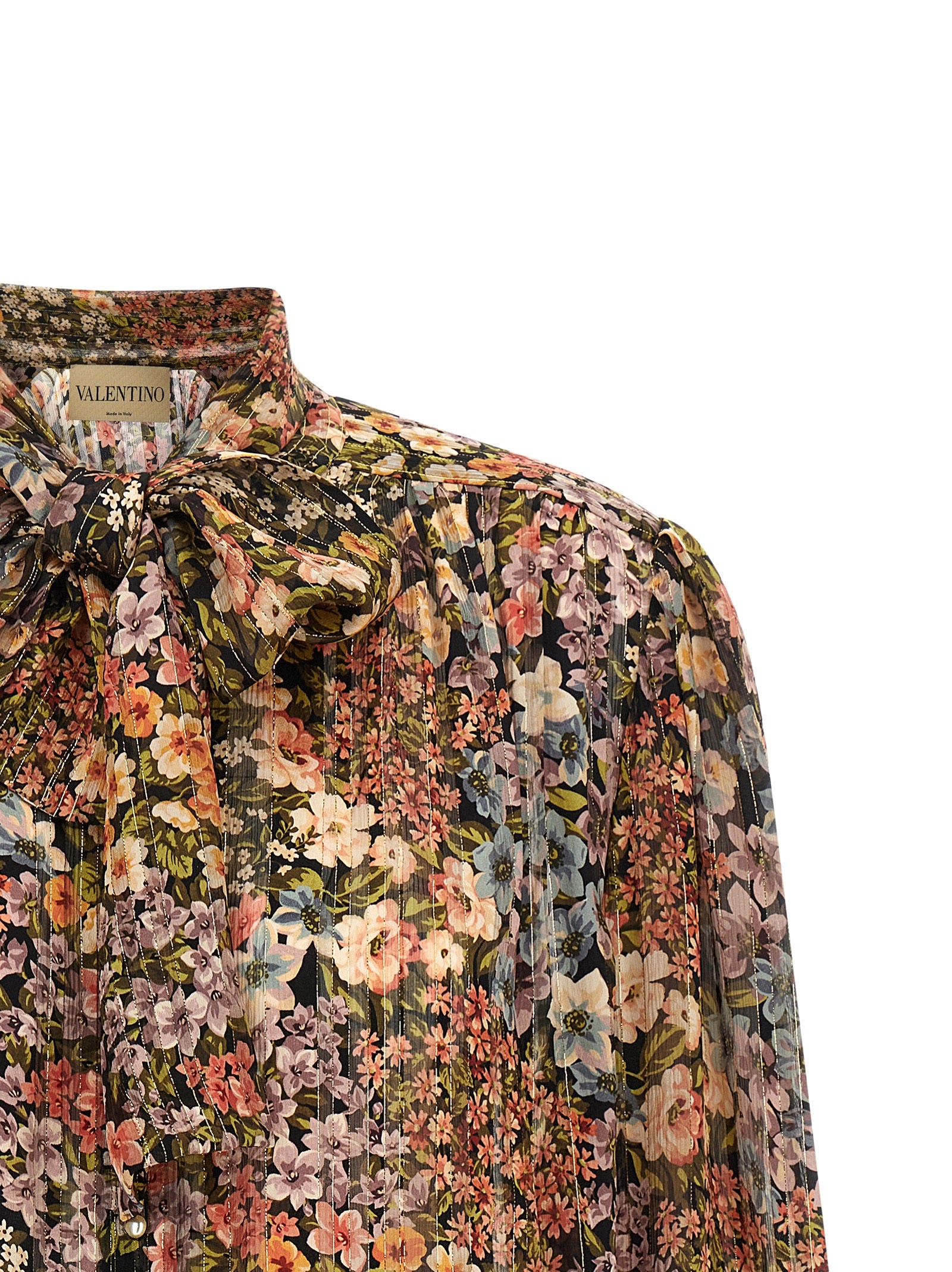 Indulge in Valentino Garavani's Multicolor Silk Blouse, a masterpiece of Italian craftsmanship, featuring luxurious silk and a captivating floral print that elevates your elegance.