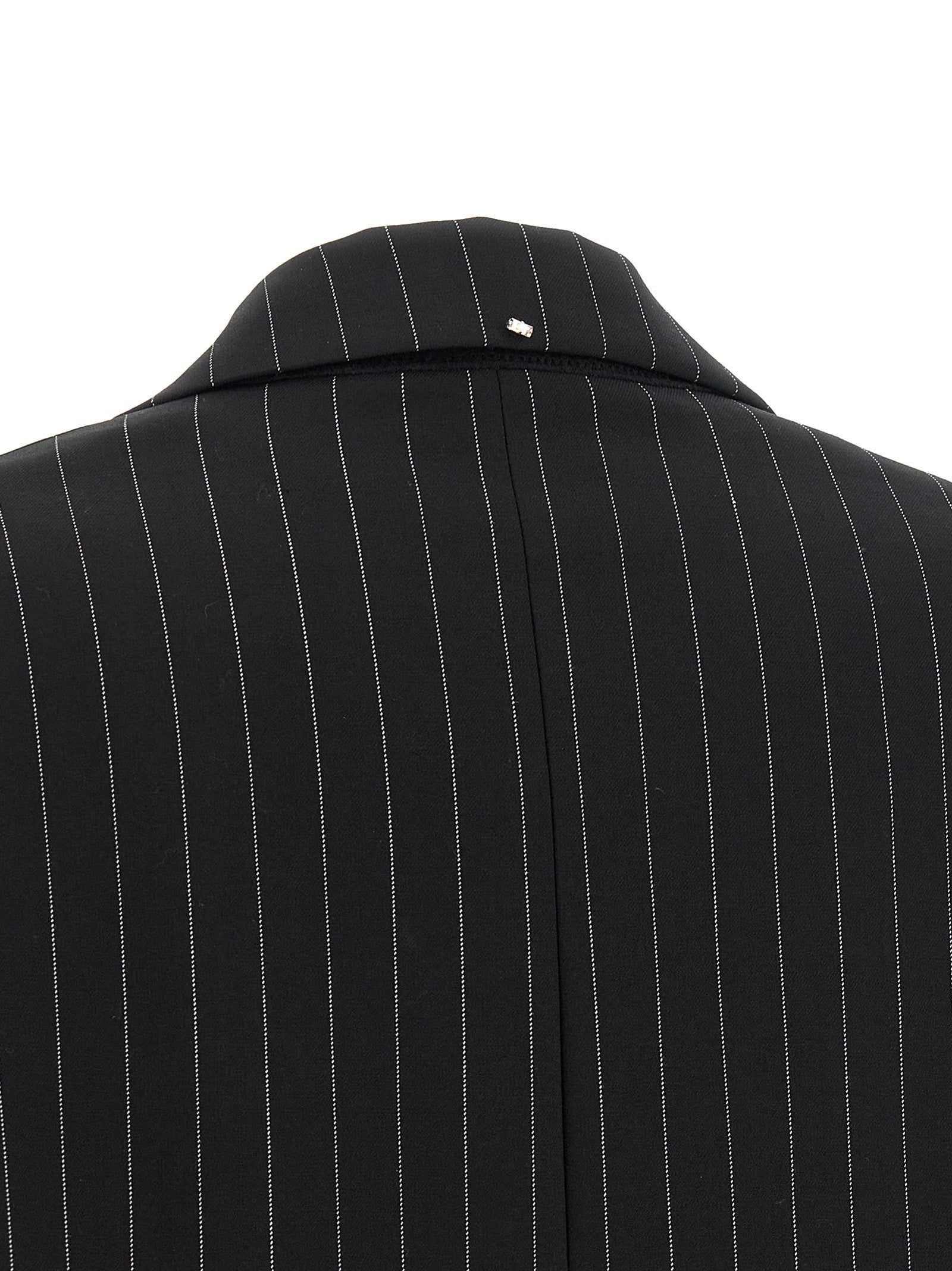 Elevate your wardrobe with the Sportmax Black Wool Blazer, a masterpiece of artisanal tailoring in luxurious stretch wool, embodying sophistication and timeless elegance.