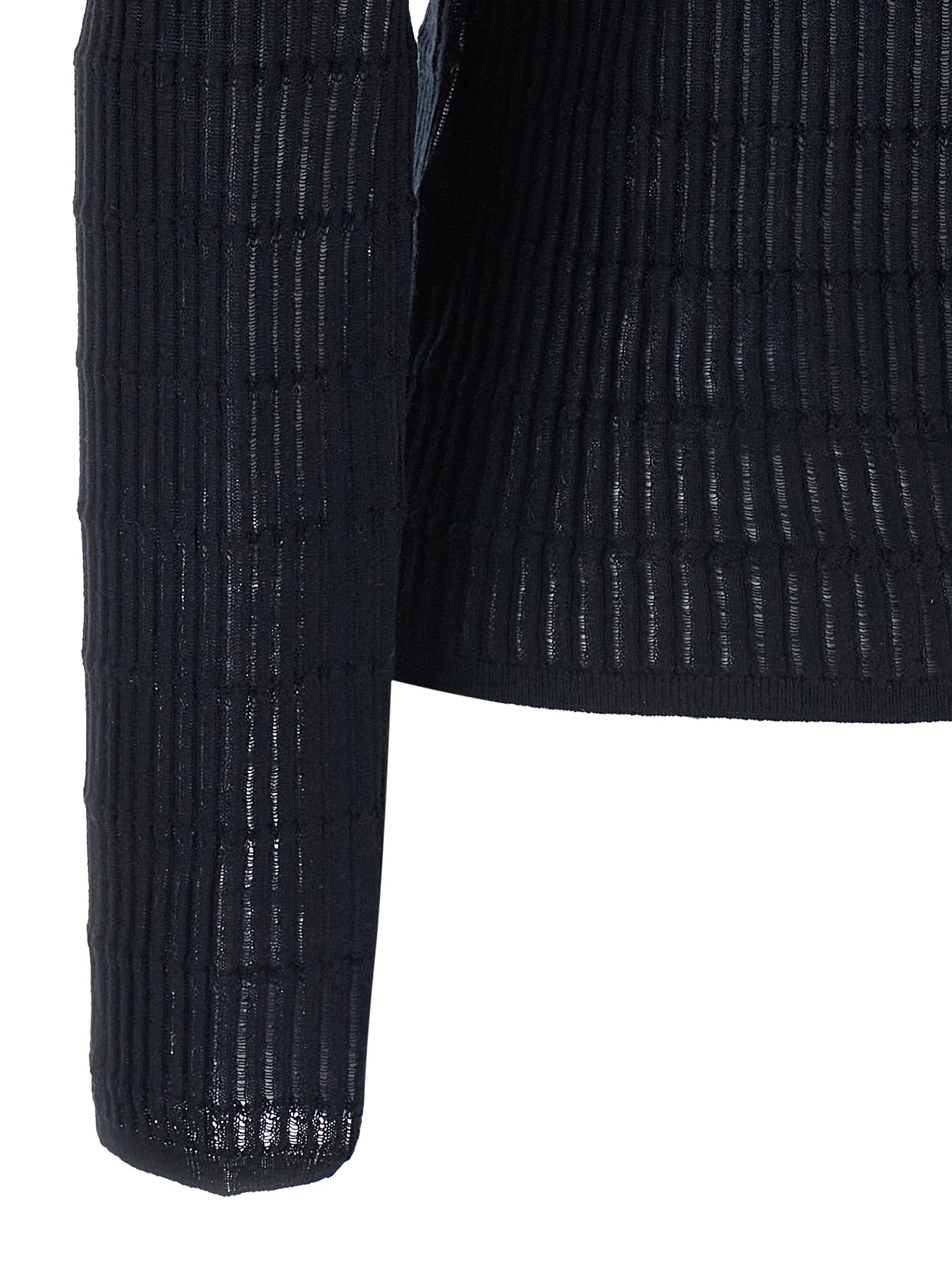 Indulge in the Max Mara Blue Silk Cardigan, a luxurious blend of silk and wool, embodying timeless elegance and modern sophistication for the discerning individual.