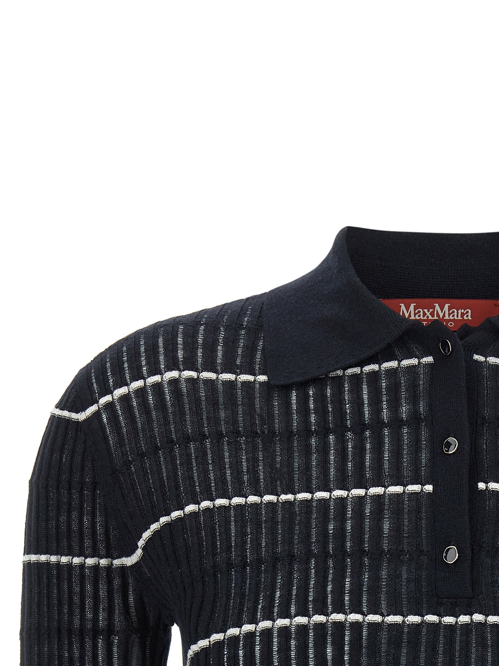Elevate your wardrobe with the Max Mara Blue Silk Polo Shirt, a luxurious blend of silk and wool, showcasing exquisite craftsmanship and timeless elegance.