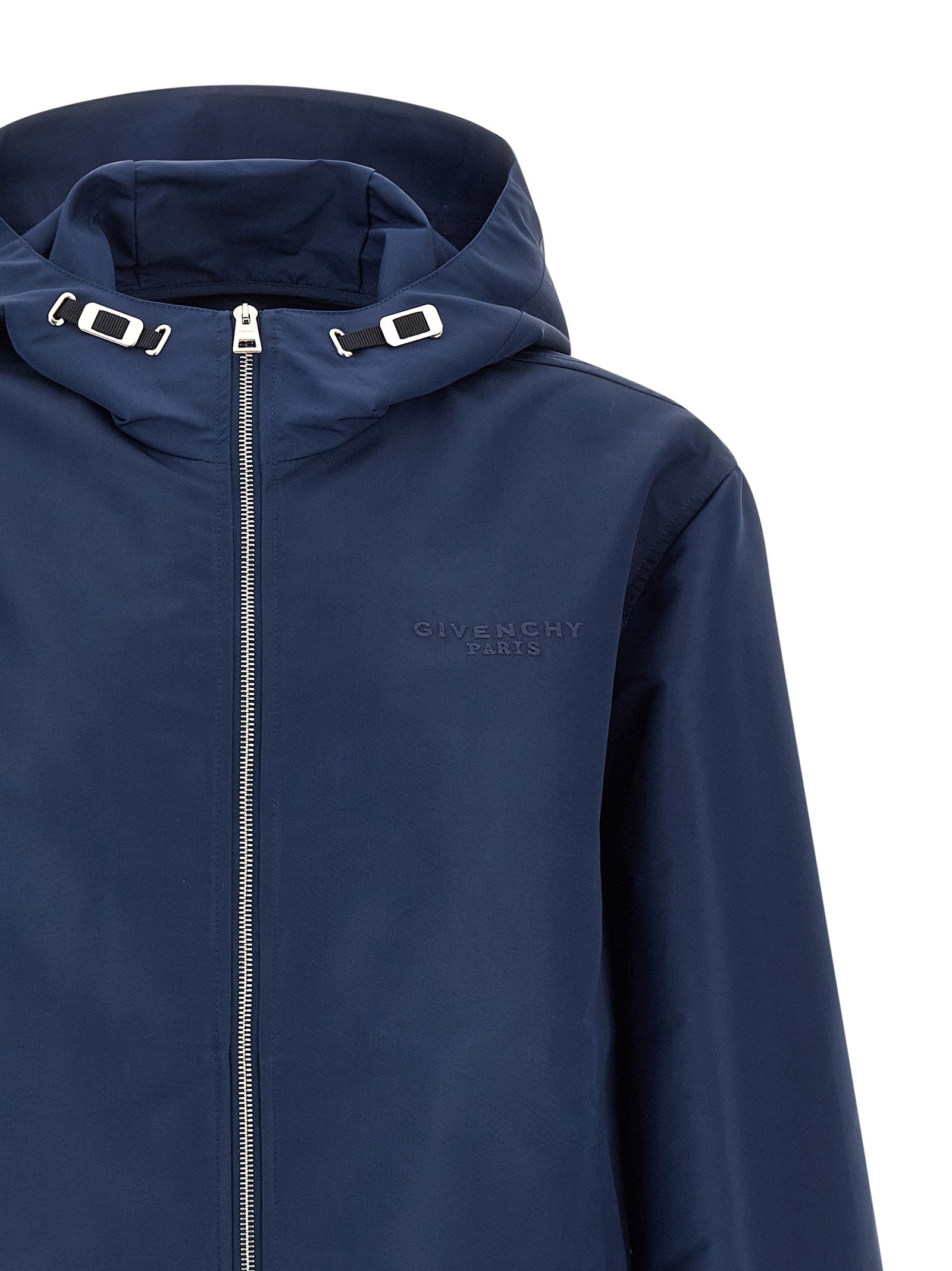 Elevate your wardrobe with the Givenchy Blue Polyester Shell Jacket, a luxurious water-repellent piece that seamlessly blends elegance and functionality for the discerning individual.