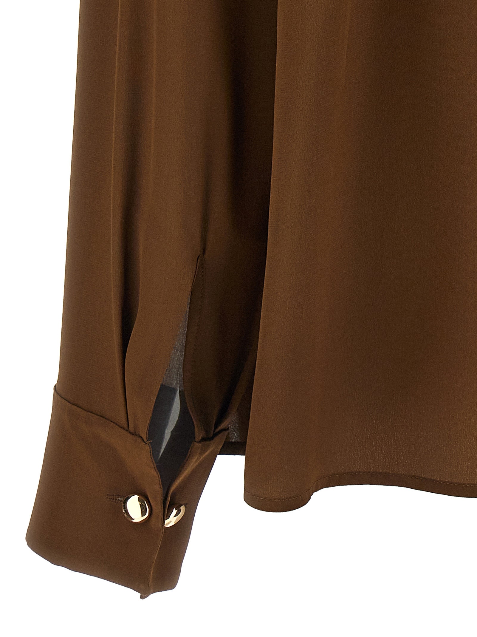 Elevate your wardrobe with the Max Mara Brown Silk Blouse, a masterpiece of artisanal craftsmanship in luxurious silk crêpe de Chine, embodying timeless elegance and sophistication.