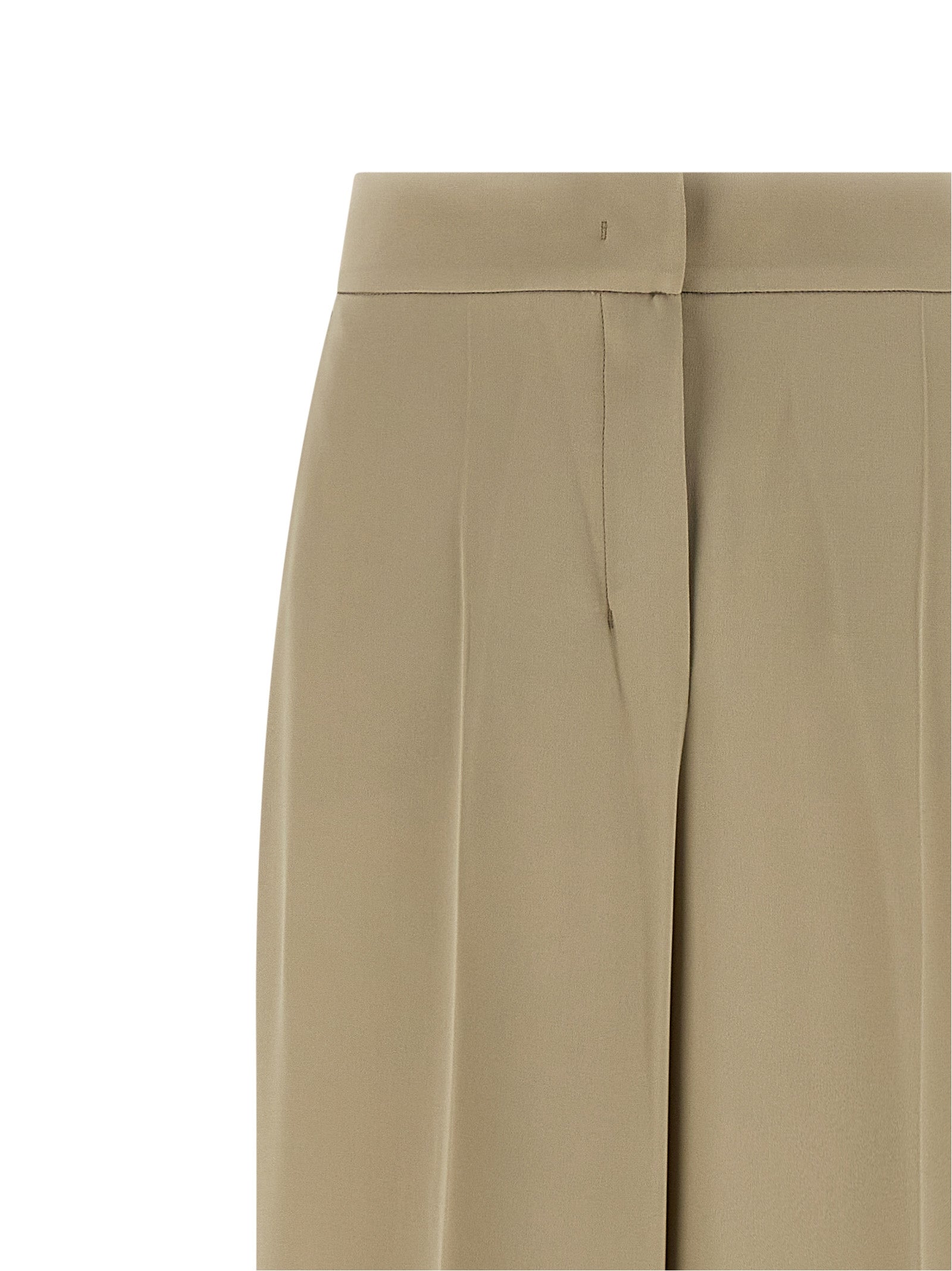 Elevate your wardrobe with Max Mara's Beige Silk Dress Pants, where artisanal craftsmanship meets luxurious silk for timeless elegance and sophisticated allure.