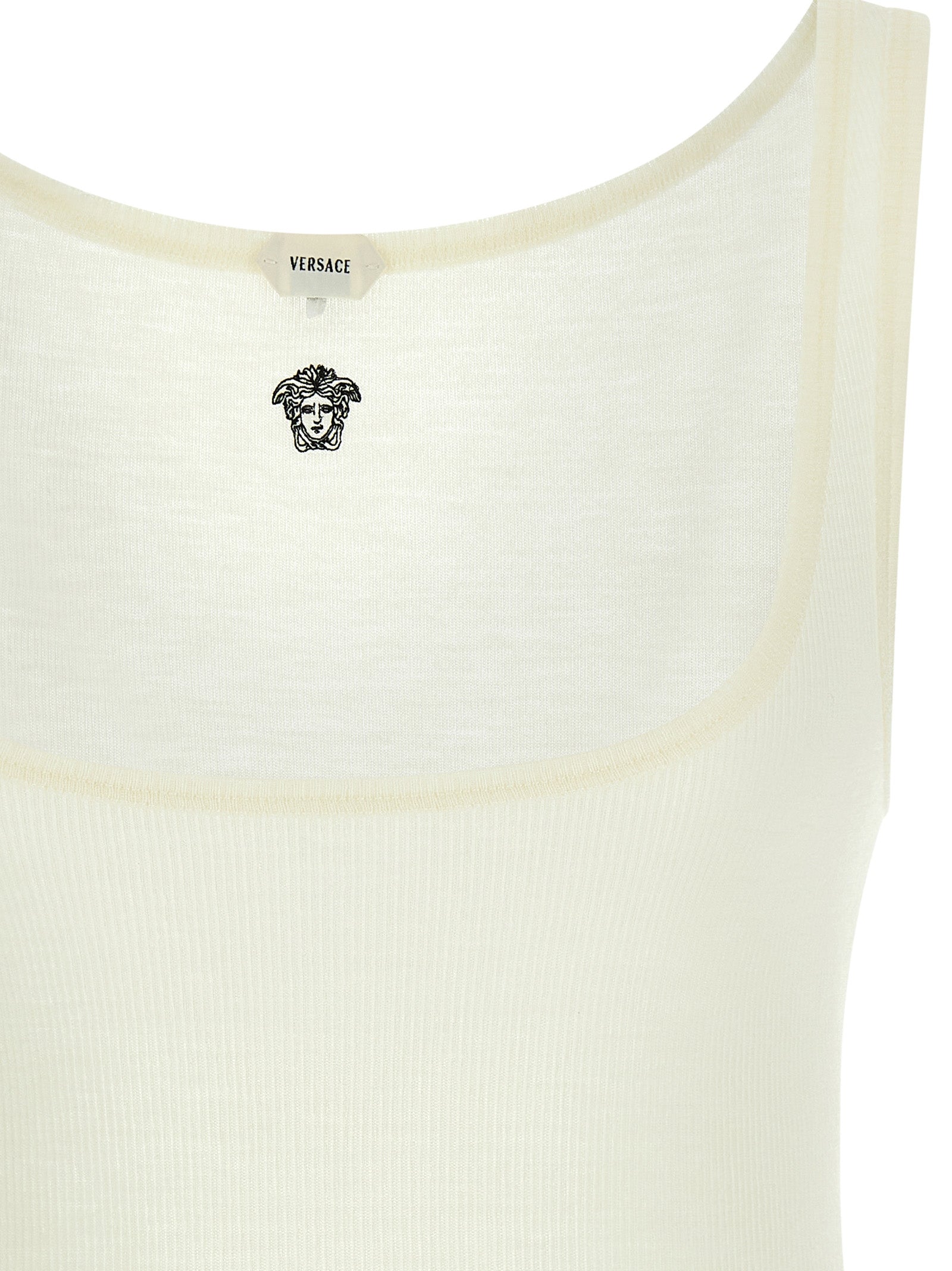 Elevate your wardrobe with the Versace White Virgin Wool Sleeveless T-Shirt, a luxurious blend of exquisite craftsmanship and timeless design, perfect for the discerning individual.