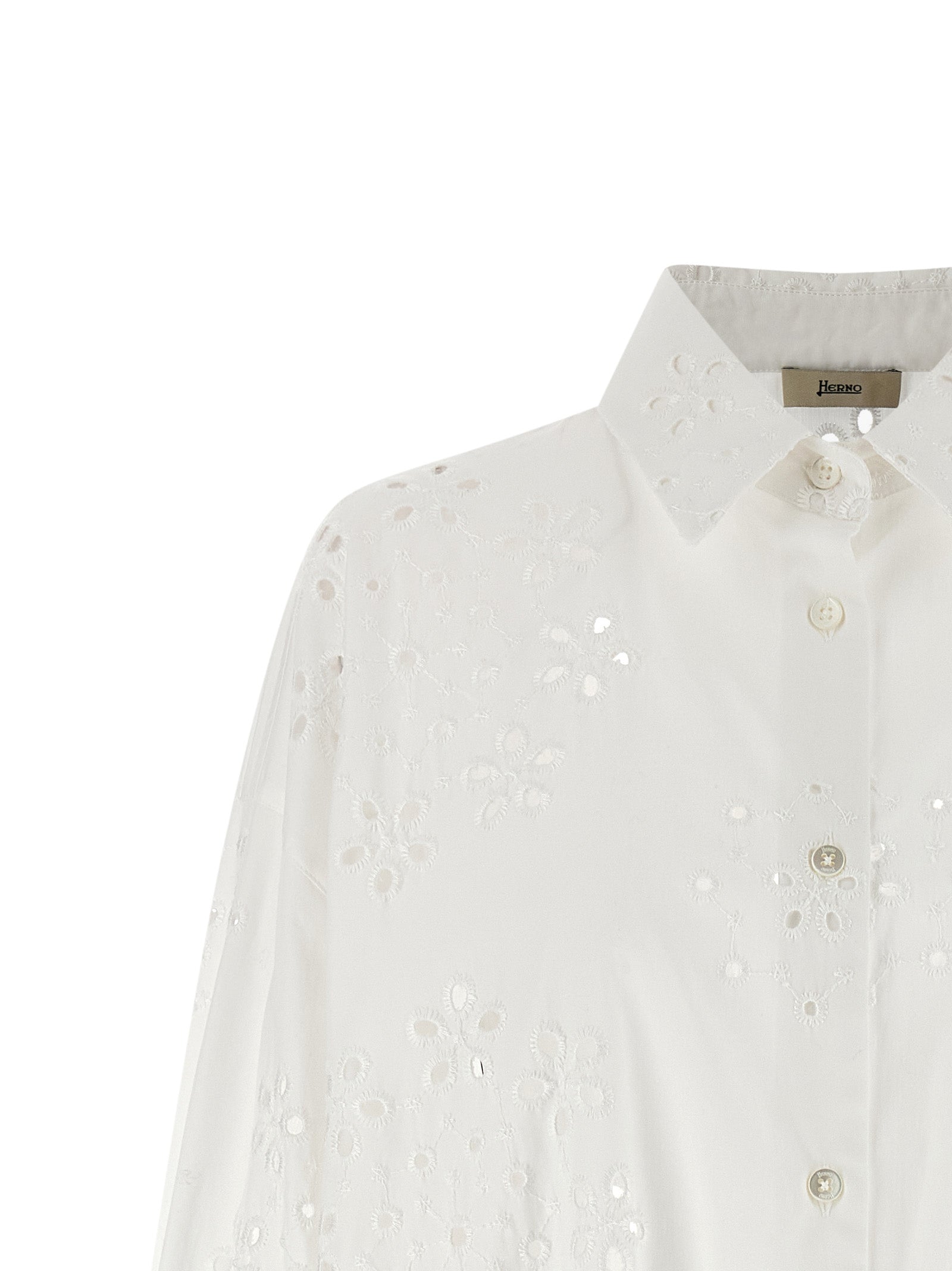 Elevate your wardrobe with the Herno White Cotton Blouse, a masterpiece of sangallo cotton and exquisite embroidery, embodying timeless elegance and sophistication.