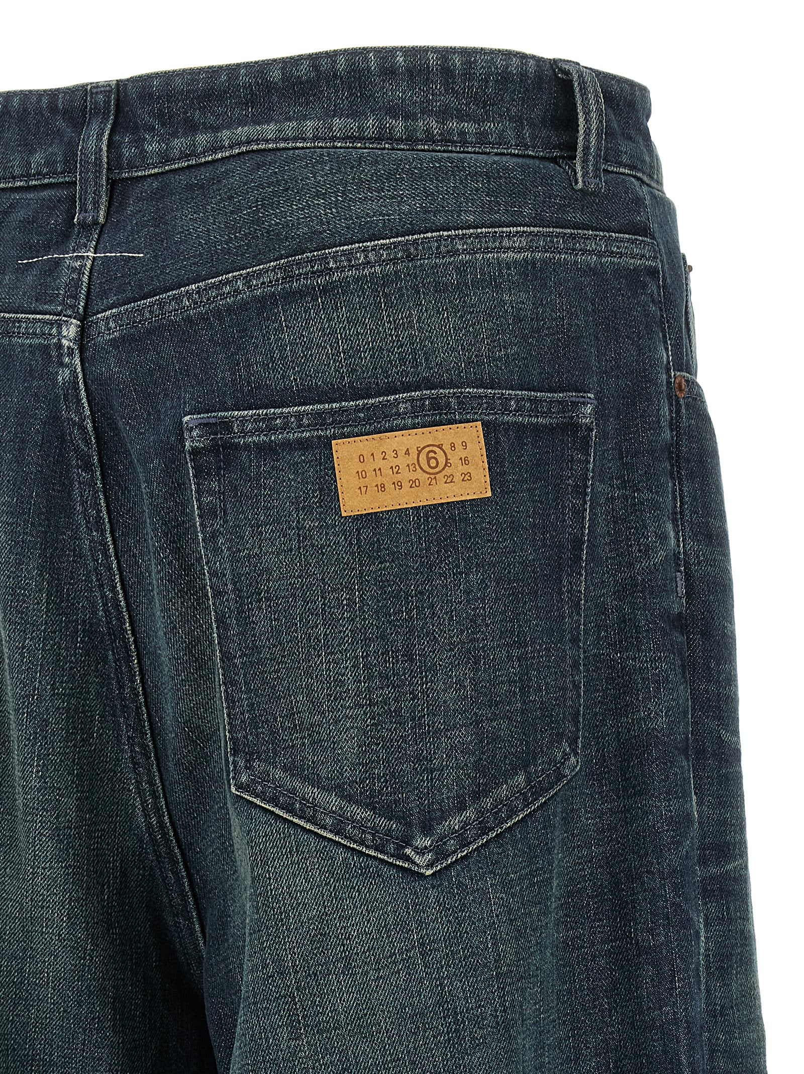 Indulge in the artisanal luxury of MM6 Maison Margiela's blue cotton jeans, where relaxed sophistication meets contemporary elegance, perfect for the discerning individual.
