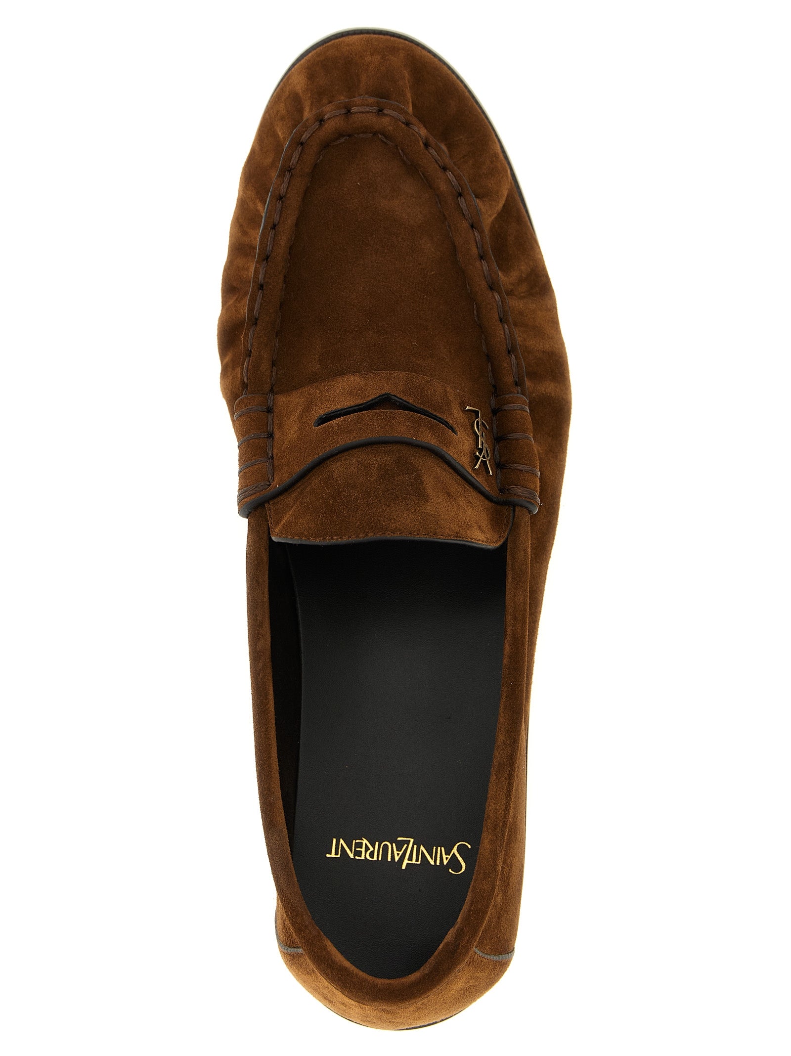 Experience the artisanal elegance of Saint Laurent's Brown Calfskin Slip-On Loafers, where luxurious craftsmanship meets timeless sophistication for the discerning individual.