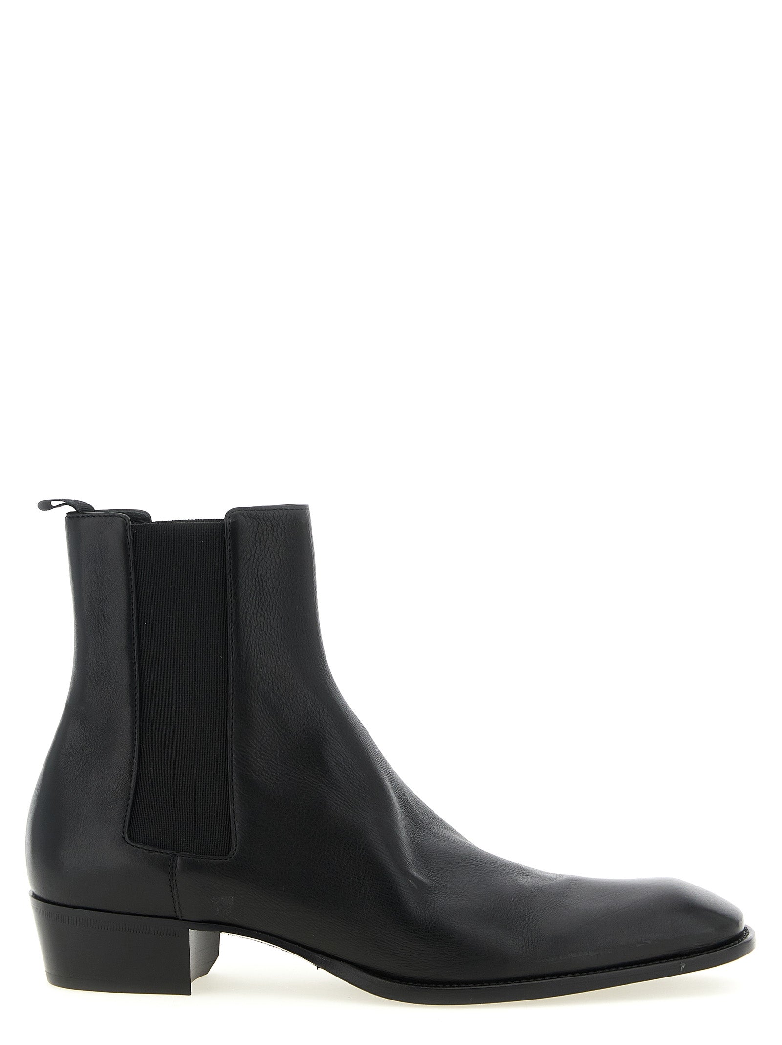 Experience the exquisite craftsmanship of Saint Laurent Black Calfskin Chelsea Boots, where timeless elegance meets modern sophistication for the discerning connoisseur.