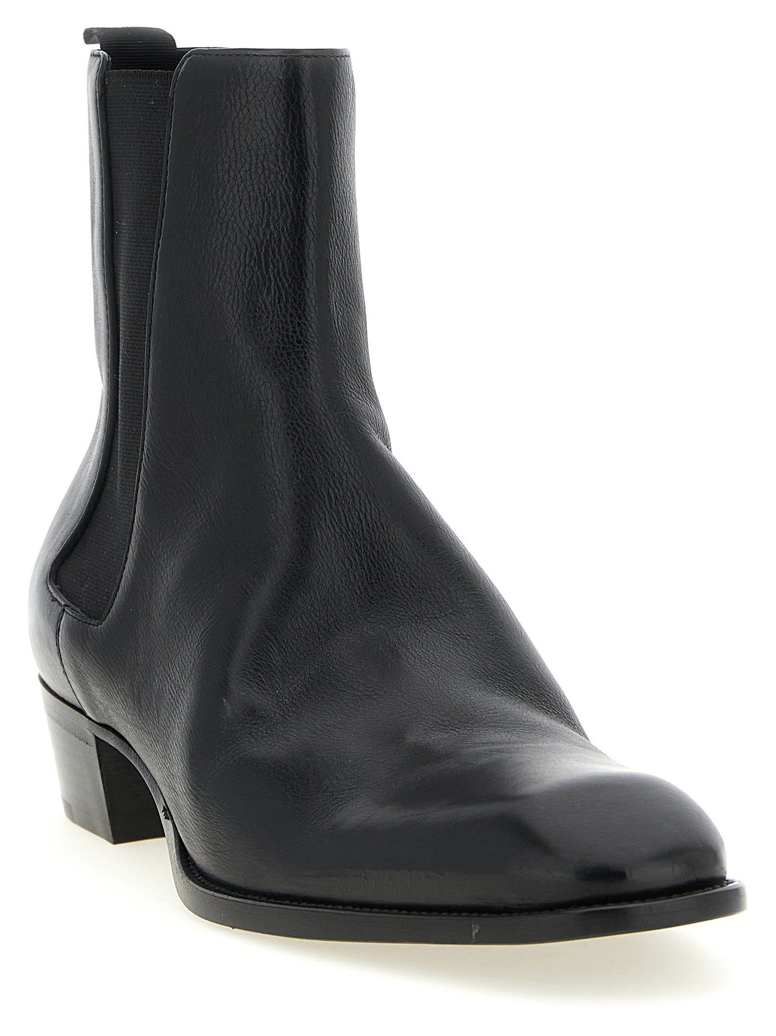 Elevate your style with Saint Laurent's Black Calfskin Chelsea Boots, where exquisite craftsmanship meets timeless elegance, perfect for the discerning trendsetter.