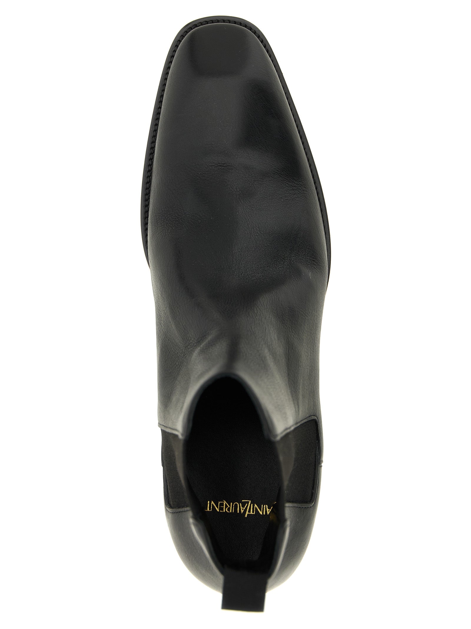 Discover the Saint Laurent Black Calfskin Chelsea Boots, a masterpiece of artisanal elegance crafted from luxurious calfskin leather, perfect for the discerning connoisseur.