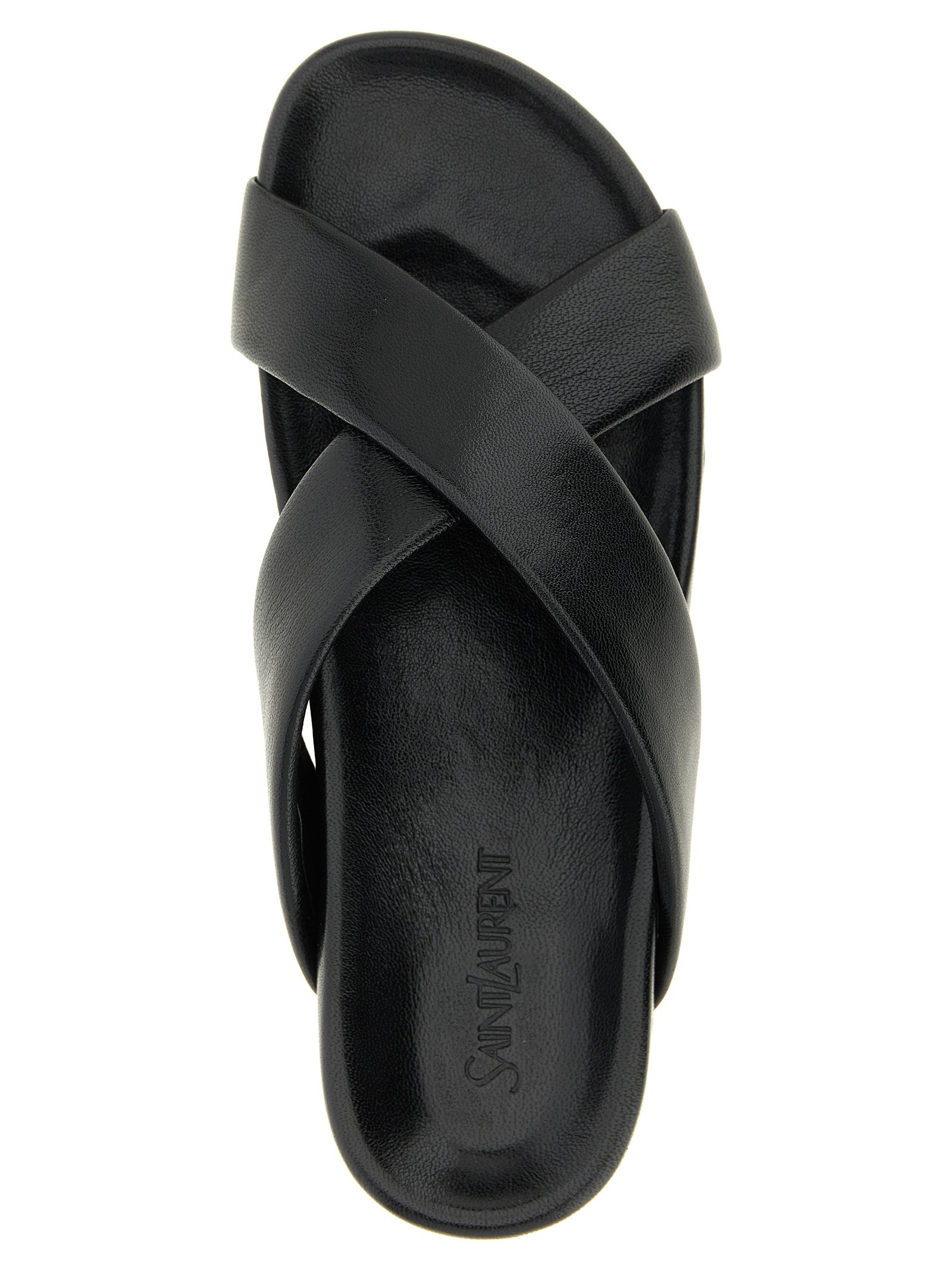 Indulge in the exquisite Saint Laurent Black Lamb Leather Slides, handcrafted in Italy from luxurious lamb leather, a timeless addition to elevate your sophisticated style.