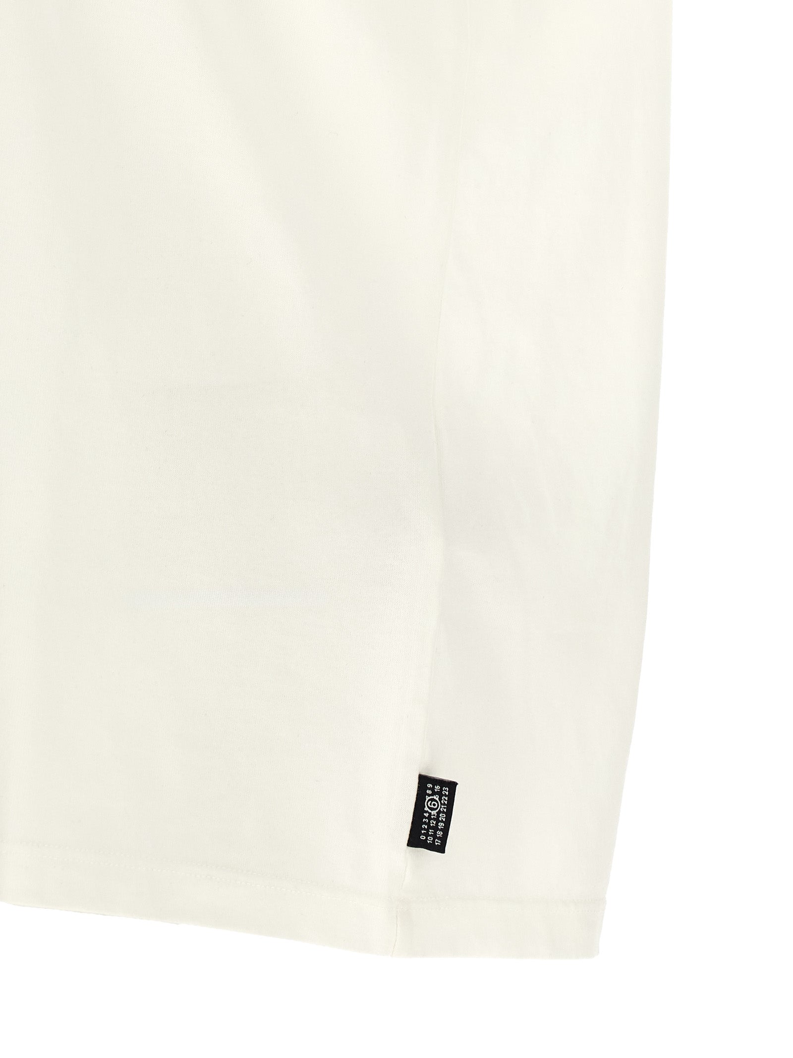 Elevate your wardrobe with the MM6 Maison Margiela White Cotton T-Shirt, a luxurious blend of Italian craftsmanship and timeless style, perfect for the discerning fashion connoisseur.