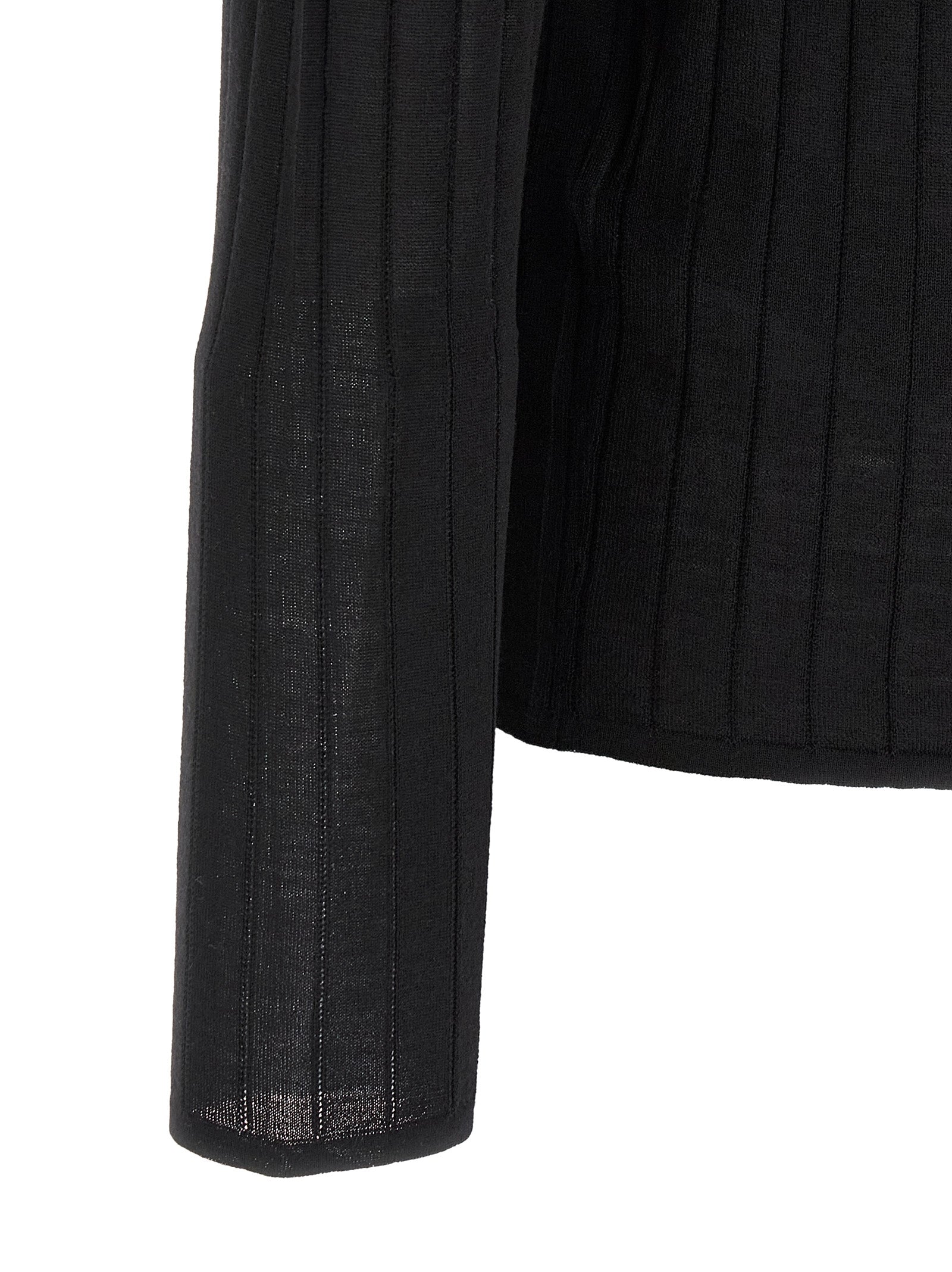Elevate your wardrobe with the Saint Laurent Black Wool Polo Shirt, a semi-transparent masterpiece of Italian craftsmanship that embodies sophistication and modern luxury.