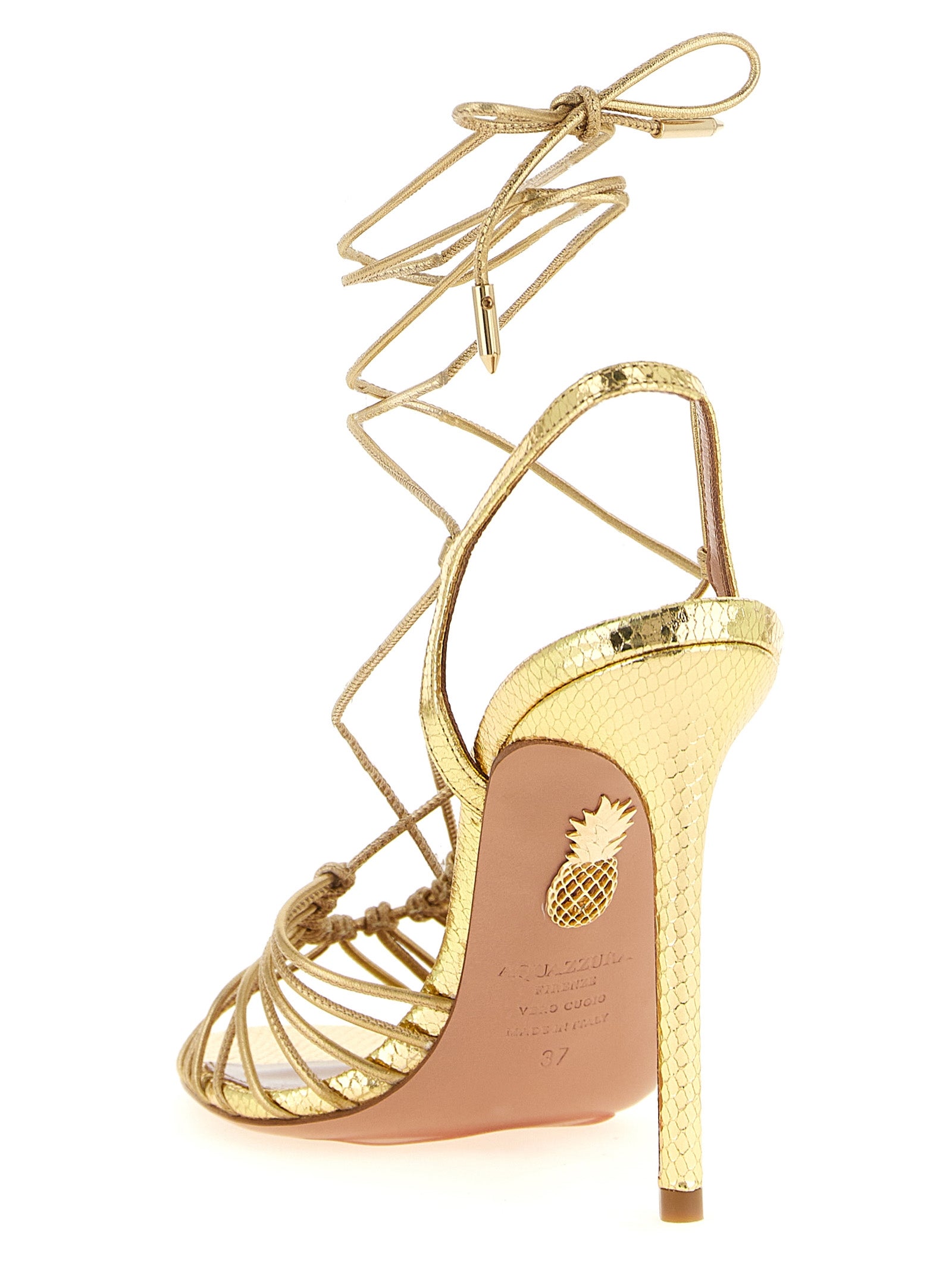 Step into a world of opulence with Aquazzura's Gold Lamb Leather Stiletto Heel Sandals, where Italian craftsmanship meets timeless elegance for the discerning connoisseur.