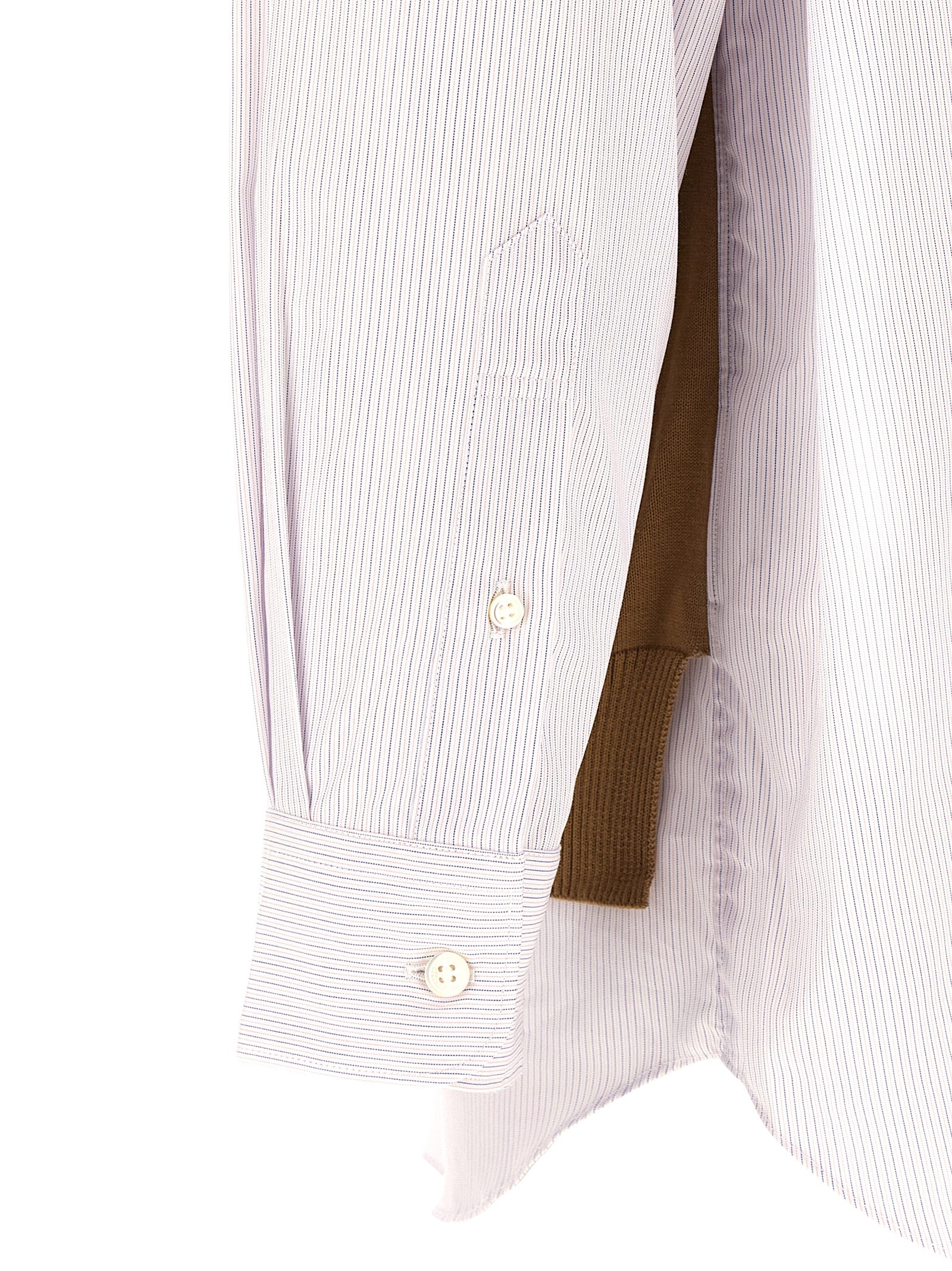 Elevate your wardrobe with the Comme Des Garçons Multicolor Cotton Blouse, a masterpiece of avant-garde design and luxurious comfort, perfect for any discerning individual.