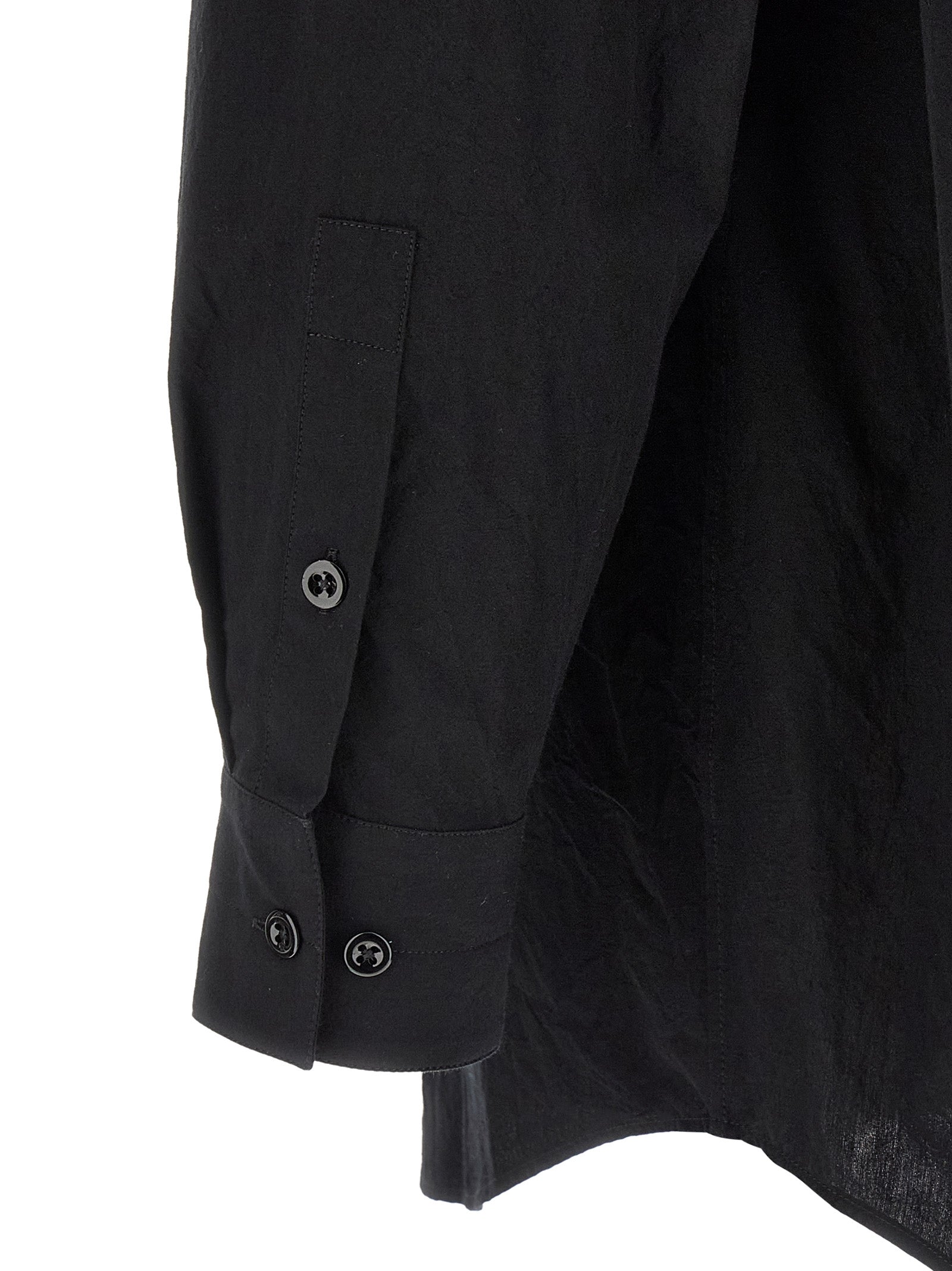 Discover the Lemaire Black Cotton Blouse, a masterclass in elegance crafted from luxurious cotton, perfect for those who embody sophistication and timeless style.
