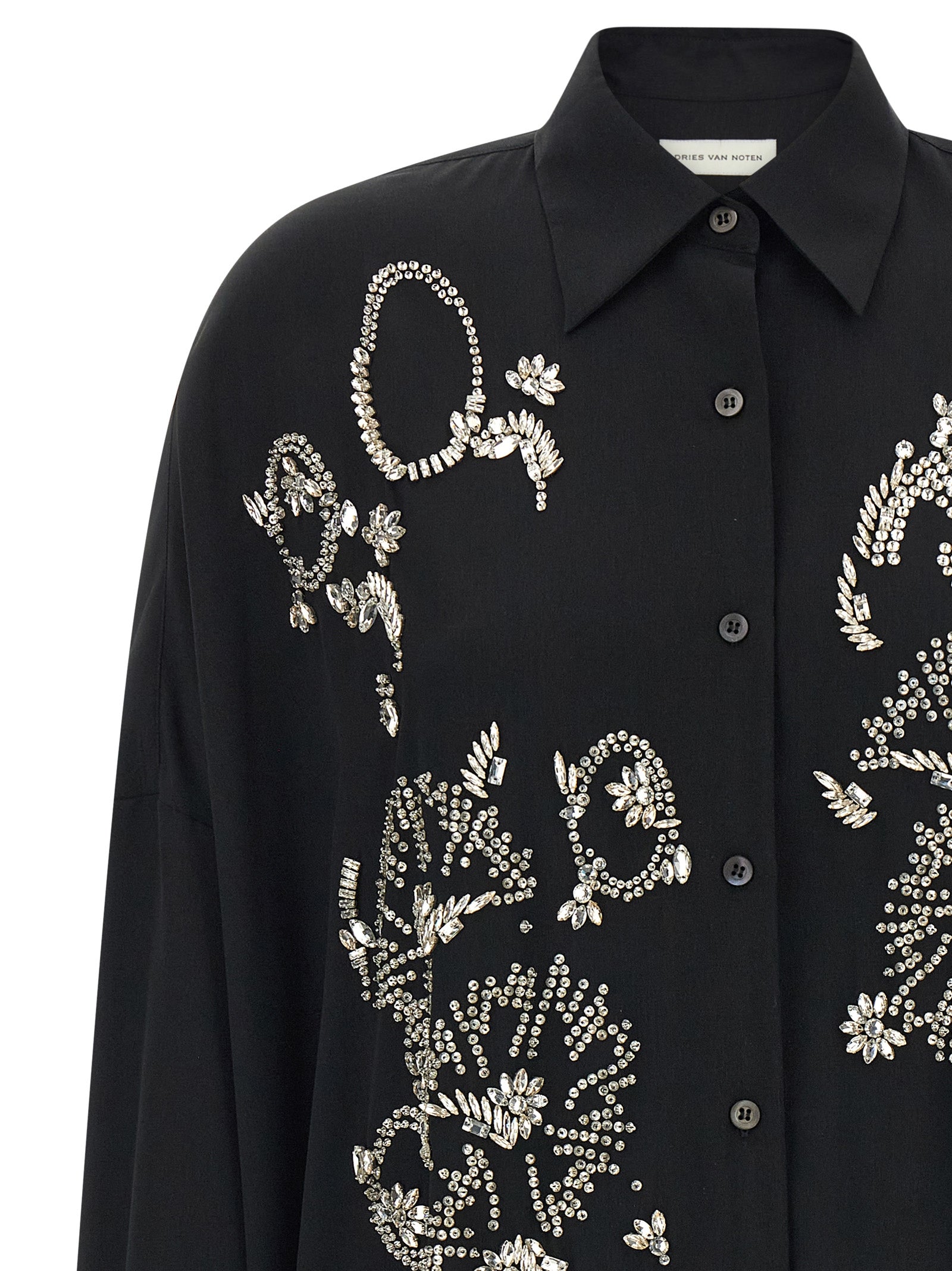 Discover the Dries Van Noten Black Polyester Blouse, a masterpiece of elegance with dazzling crystal appliqué, perfect for those who embody sophistication and allure.