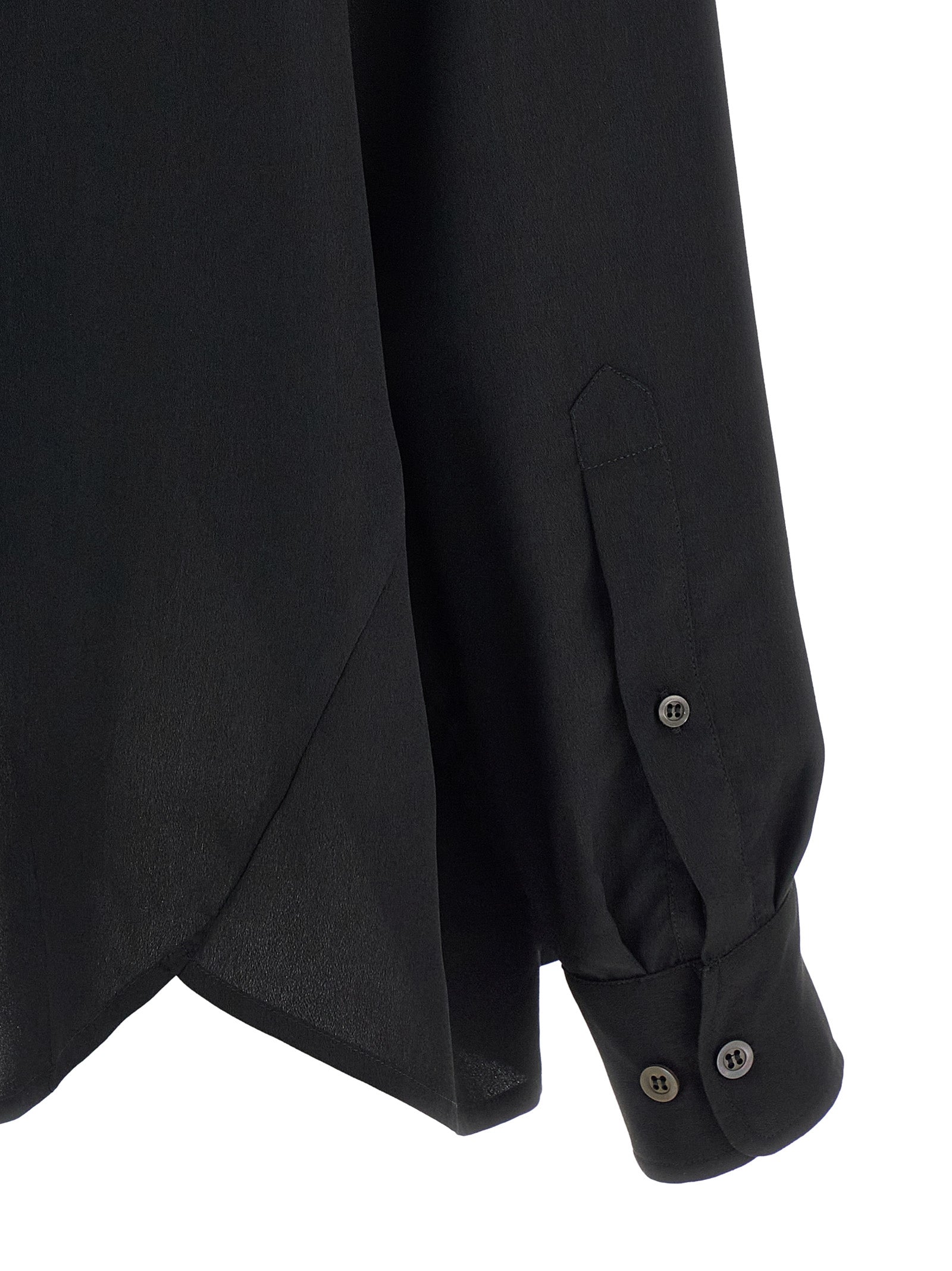 Discover the Dries Van Noten Black Polyester Blouse, a masterpiece of luxury craftsmanship adorned with crystal appliqué, perfect for making a bold statement in any setting.