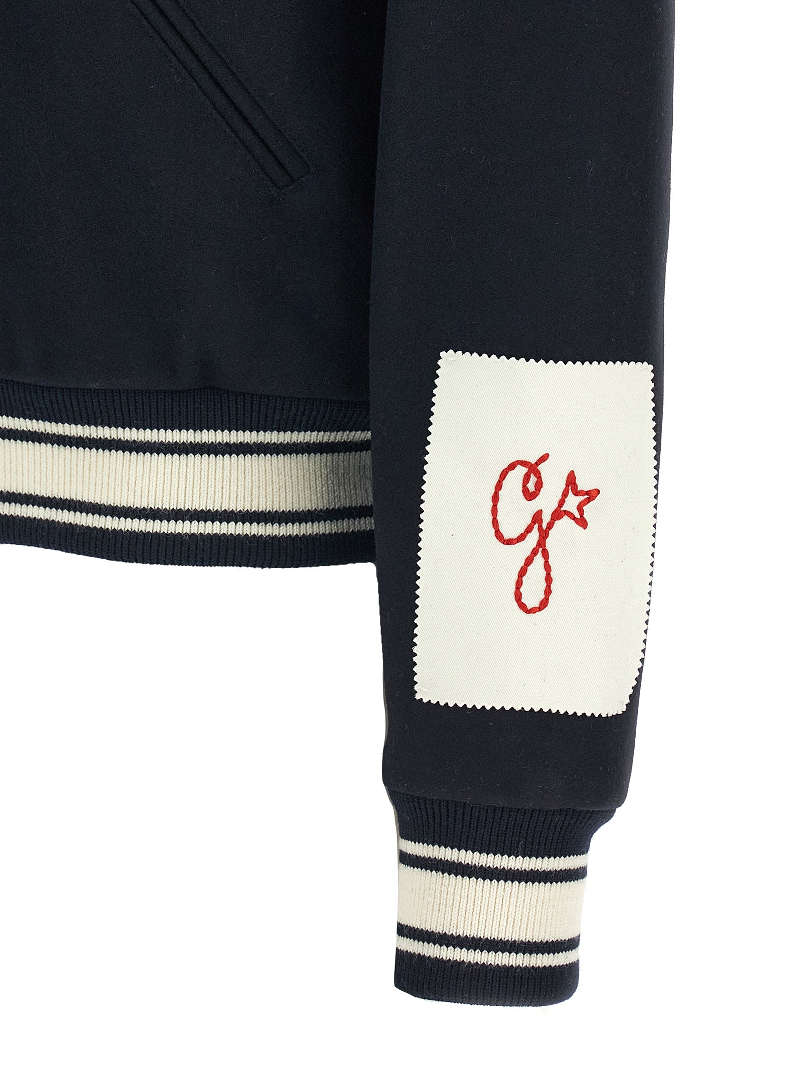 Indulge in the Golden Goose Blue Virgin Wool Bomber, a luxurious blend of 72% virgin wool and 28% polyamide, epitomizing sophistication and timeless elegance.