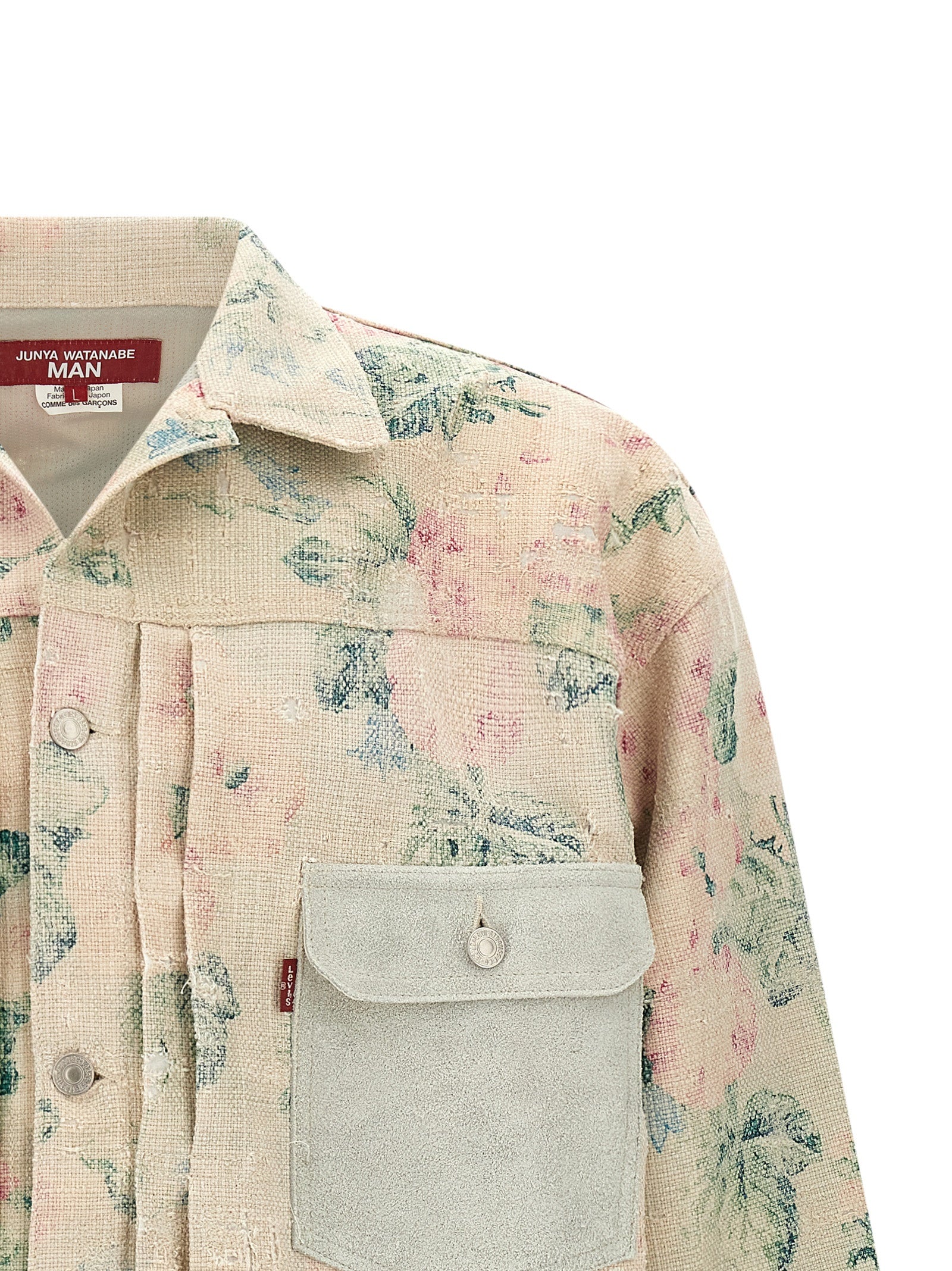 Experience the allure of the Junya Watanabe Multicolor Rayon Denim Jacket, where exquisite craftsmanship meets floral elegance, redefining luxury for the discerning individual.