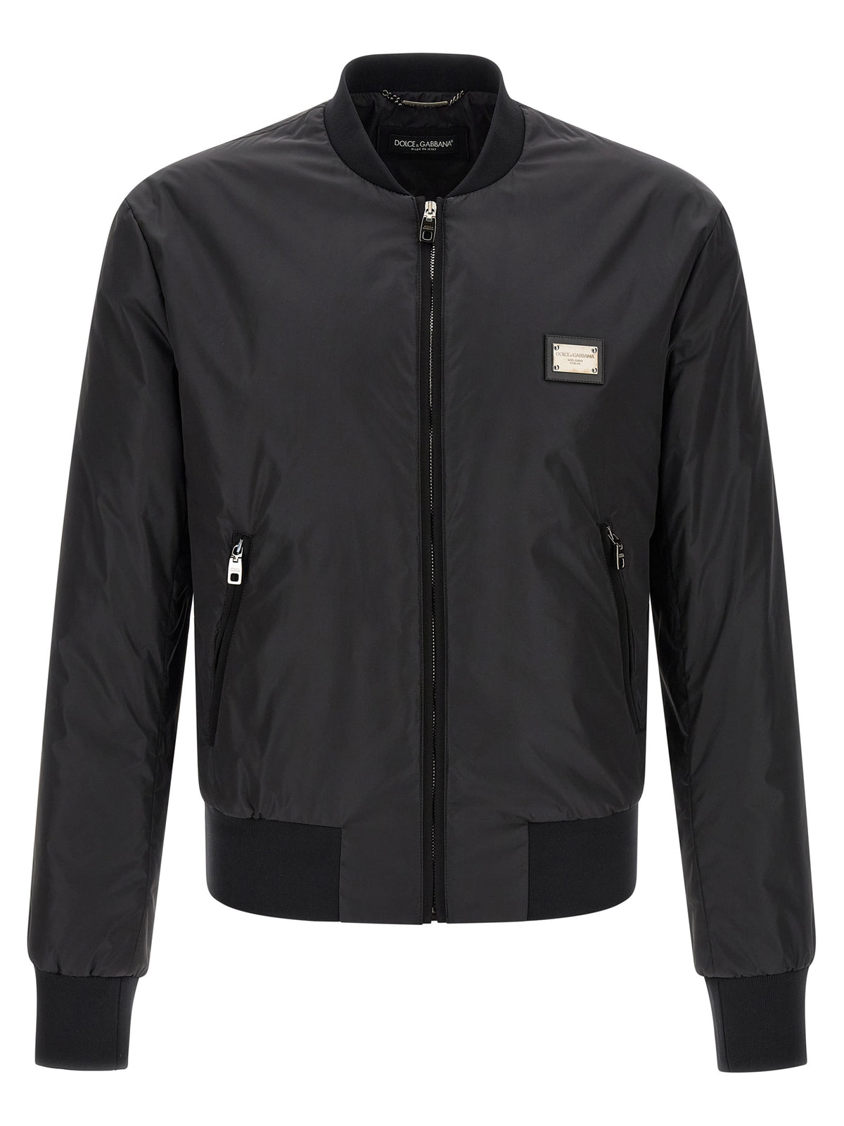 Elevate your wardrobe with the Dolce & Gabbana Black Polyamide Bomber, a masterpiece of Italian craftsmanship that embodies timeless luxury and sophisticated elegance.