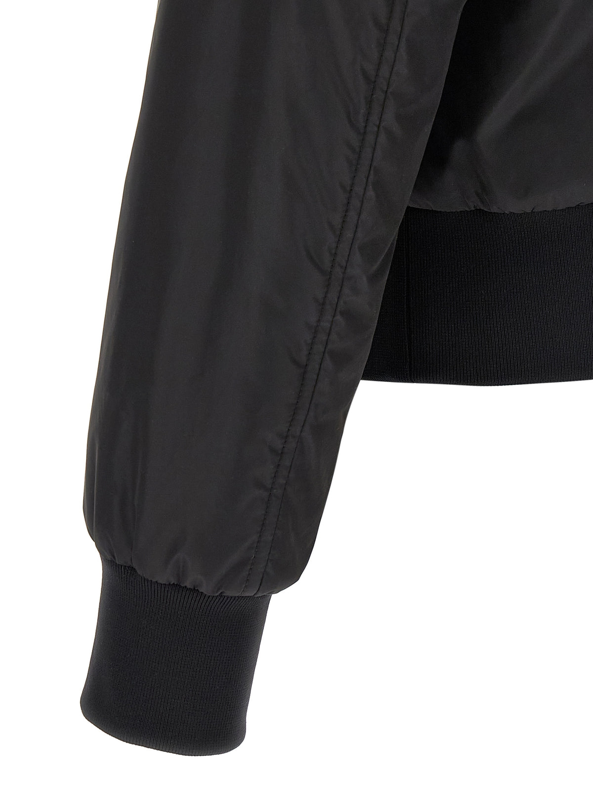 Experience the exquisite Dolce & Gabbana Black Polyamide Bomber, a masterful blend of artisanal luxury and contemporary style, perfect for the discerning individual.