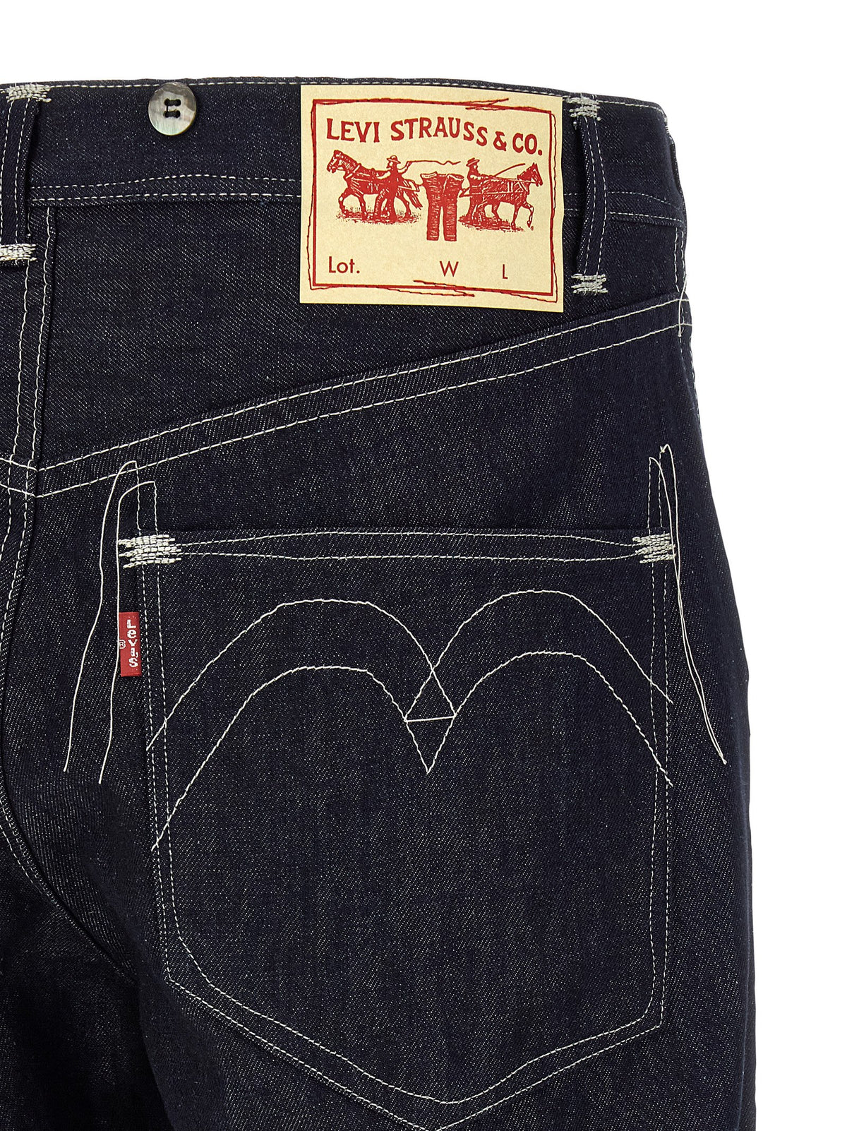 Indulge in the exquisite craftsmanship of Junya Watanabe's Blue Cotton Straight-Leg Jeans, a luxurious blend of cotton and linen, perfect for the discerning fashion connoisseur.