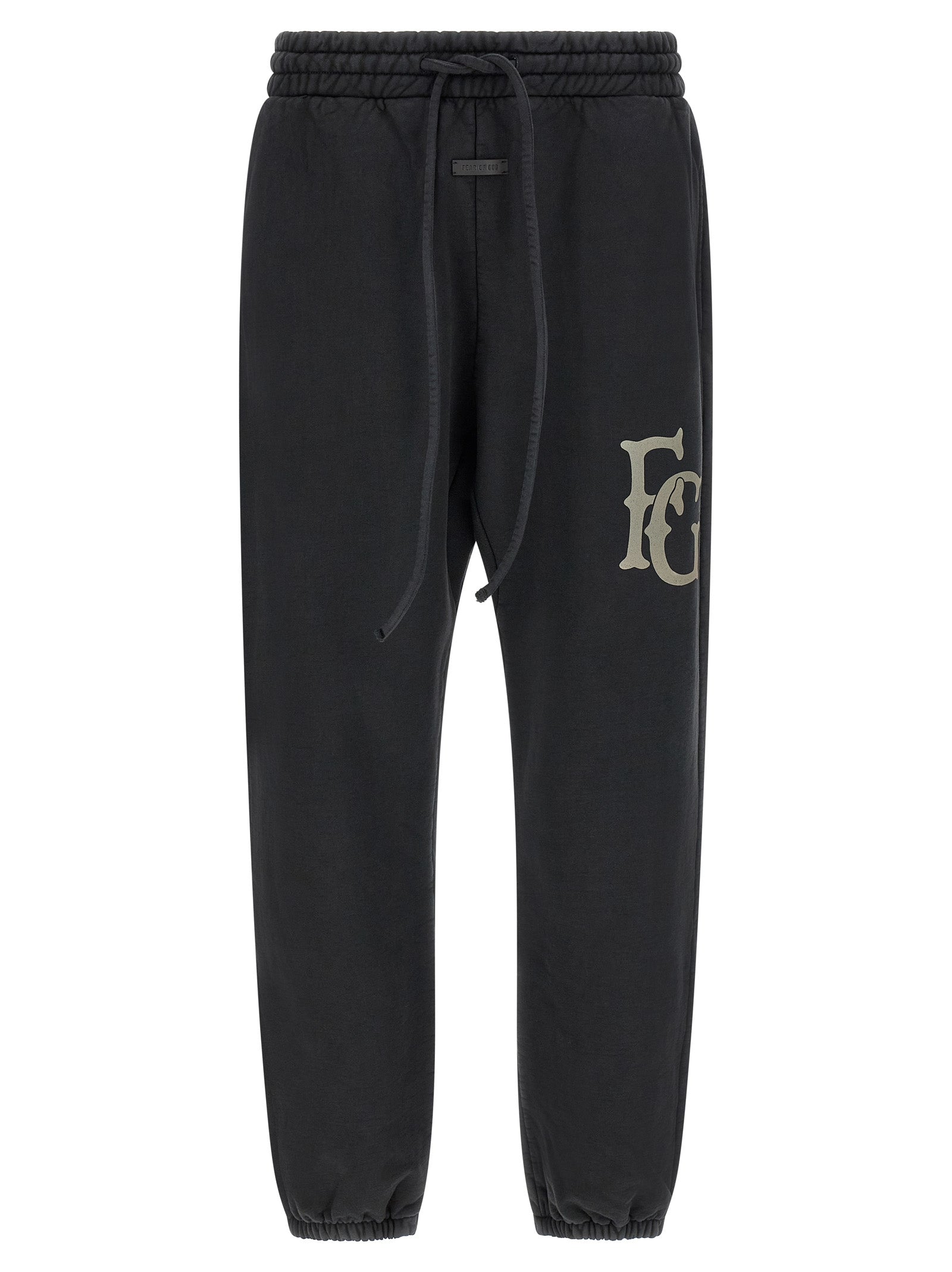 Elevate your wardrobe with Fear Of God Black Cotton Joggers, where luxurious heavy cotton meets sophisticated design, perfect for the modern connoisseur.