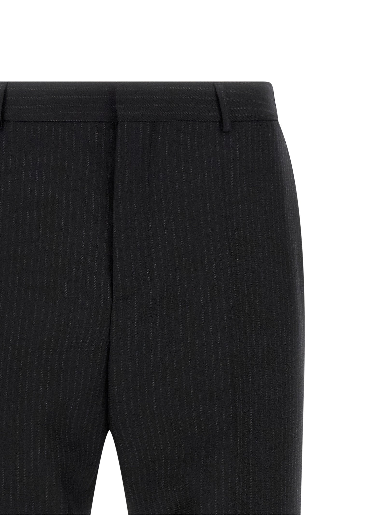 Elevate your wardrobe with Saint Laurent's Black Wool Dress Pants, expertly tailored in Italy from luxurious wool, embodying timeless elegance and sophisticated allure.