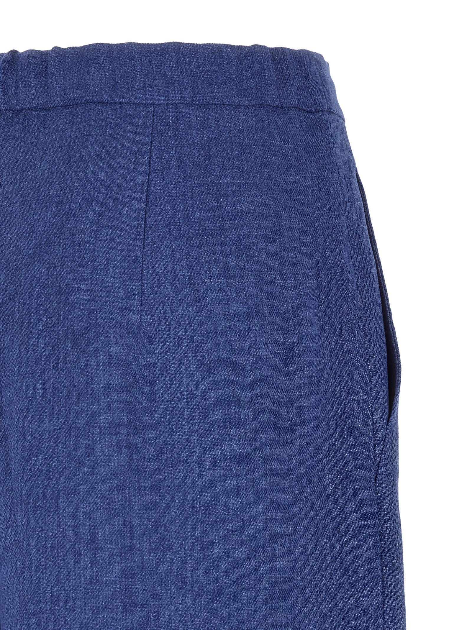Indulge in the artistry of Max Mara's Blue Linen Casual Pants, crafted from 100% linen for a sophisticated, relaxed silhouette that embodies effortless elegance.