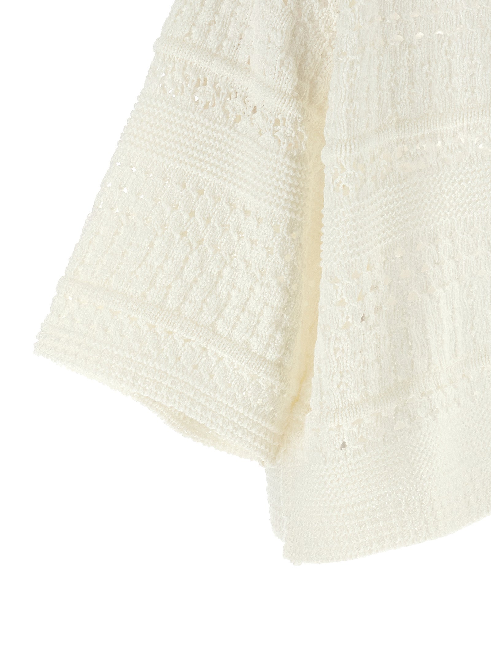Elevate your wardrobe with the Max Mara White Cotton Cardigan from the Weekend Max Mara collection, showcasing artisan craftsmanship and a unique perforated design for timeless elegance.