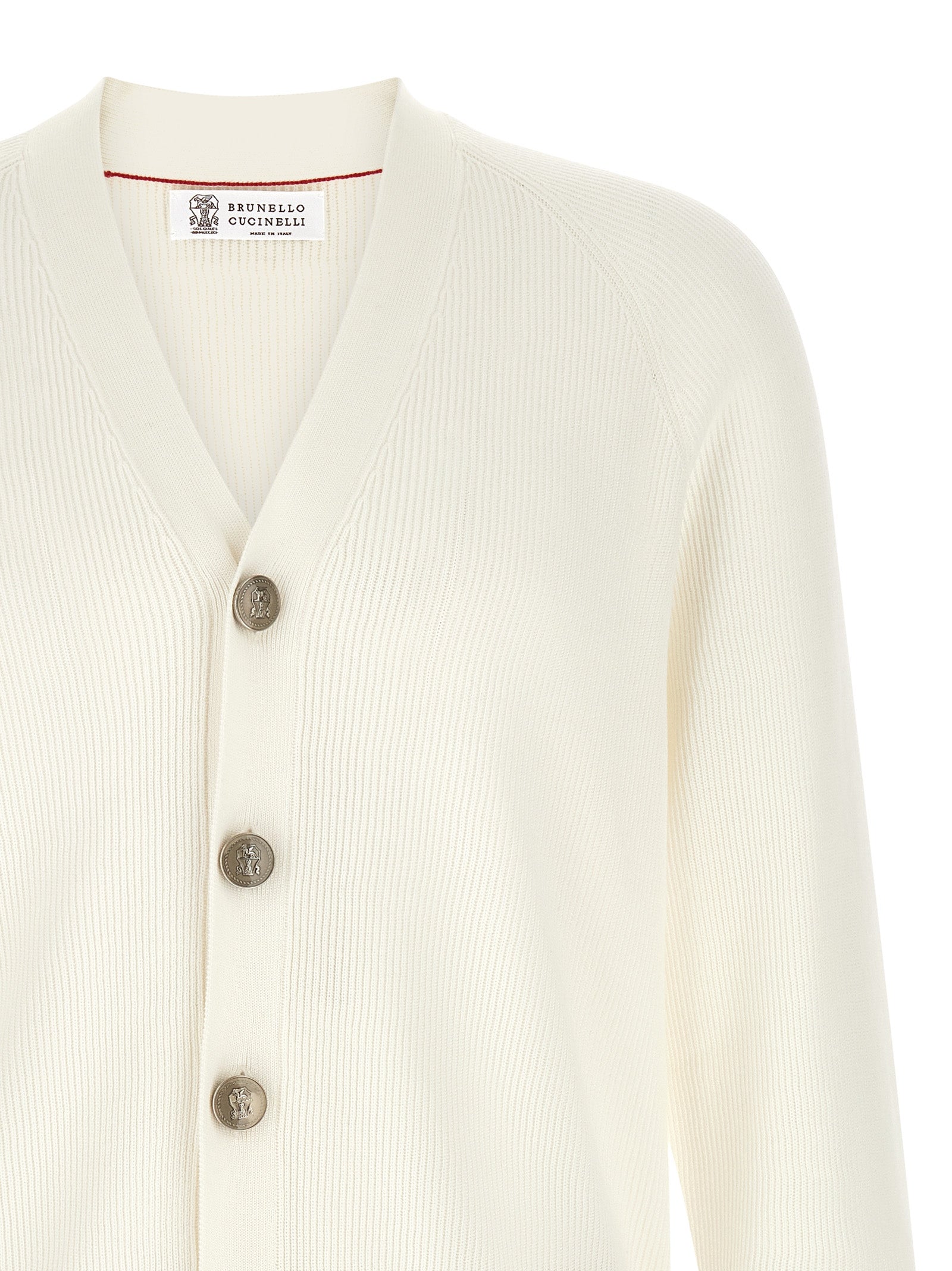 Elevate your wardrobe with the Brunello Cucinelli White Cotton Cardigan, a masterpiece of Italian craftsmanship that embodies timeless luxury and sophistication.