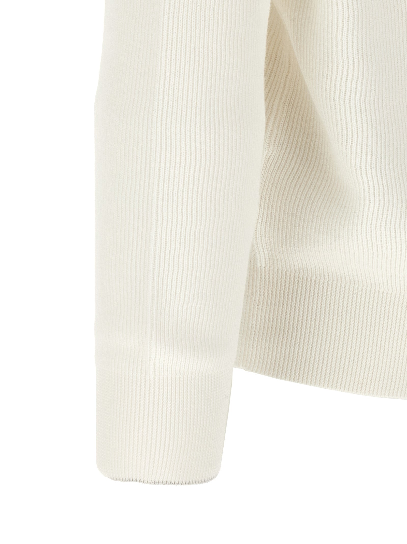 Elevate your wardrobe with the Brunello Cucinelli White Cotton Cardigan, a masterpiece of Italian craftsmanship, offering timeless elegance and luxurious comfort.