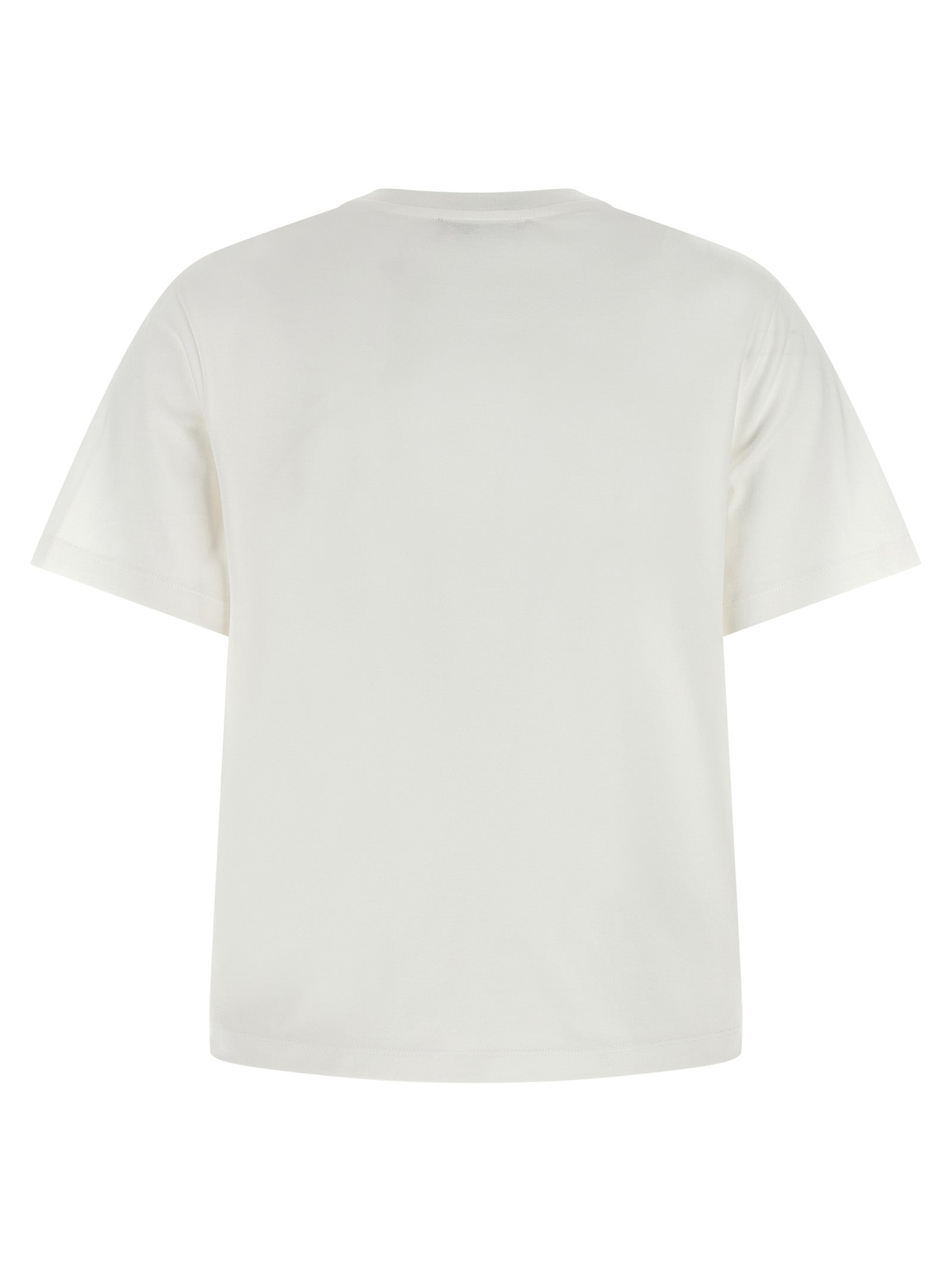 Experience the allure of Tory Burch's Floral Applique Cotton T-Shirt, a luxurious blend of 100% cotton that embodies elegance and sophistication for the discerning individual.