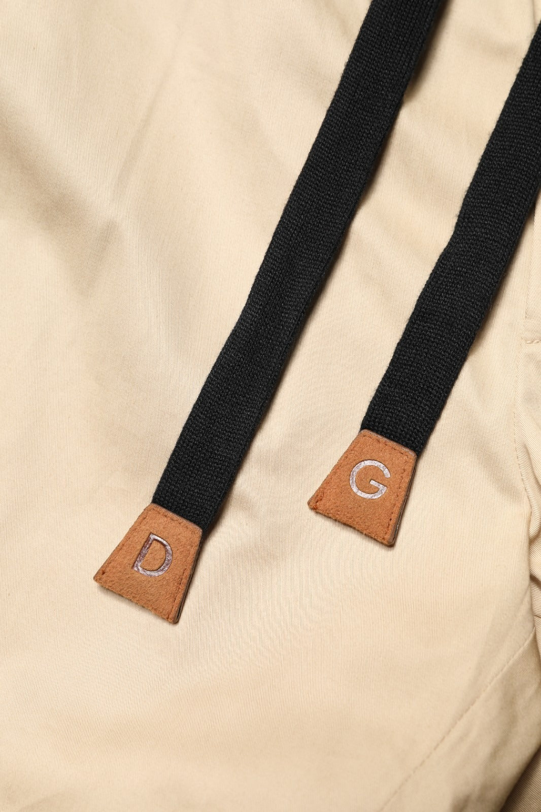 Indulge in the refined elegance of Dolce & Gabbana's beige cotton skinny jogger trousers, where Italian craftsmanship meets luxurious comfort for the modern connoisseur.