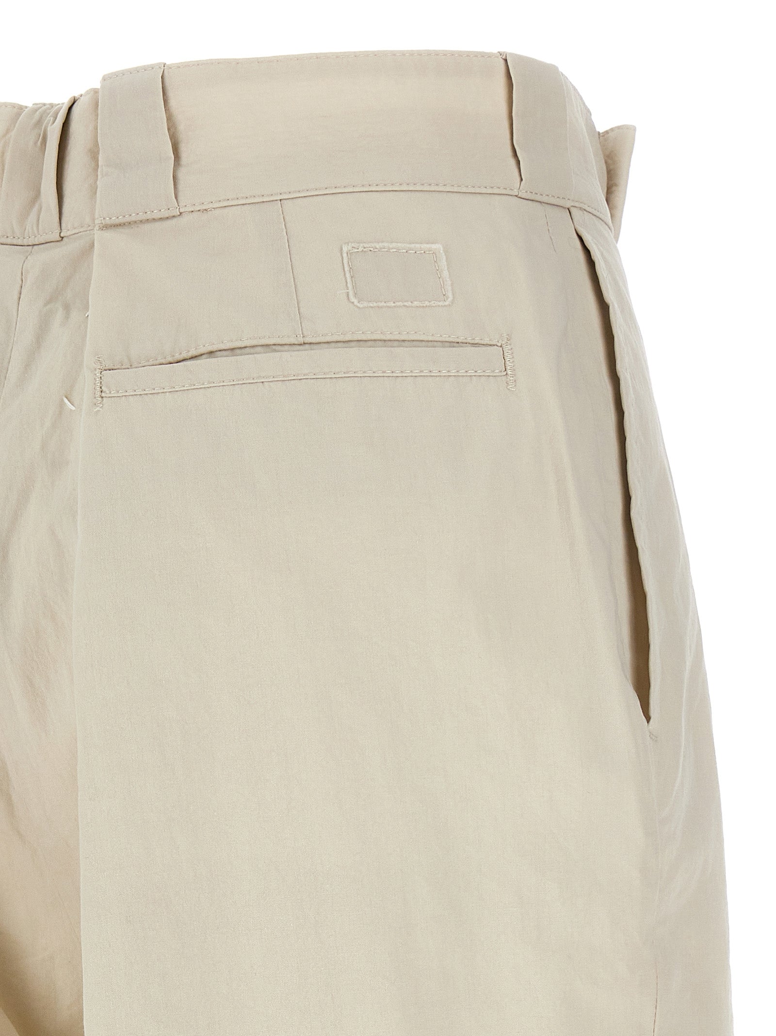 Indulge in the artisanal elegance of Maison Margiela's Beige Cotton Casual Pants, crafted in Italy for a luxurious blend of comfort and sophistication, perfect for any occasion.