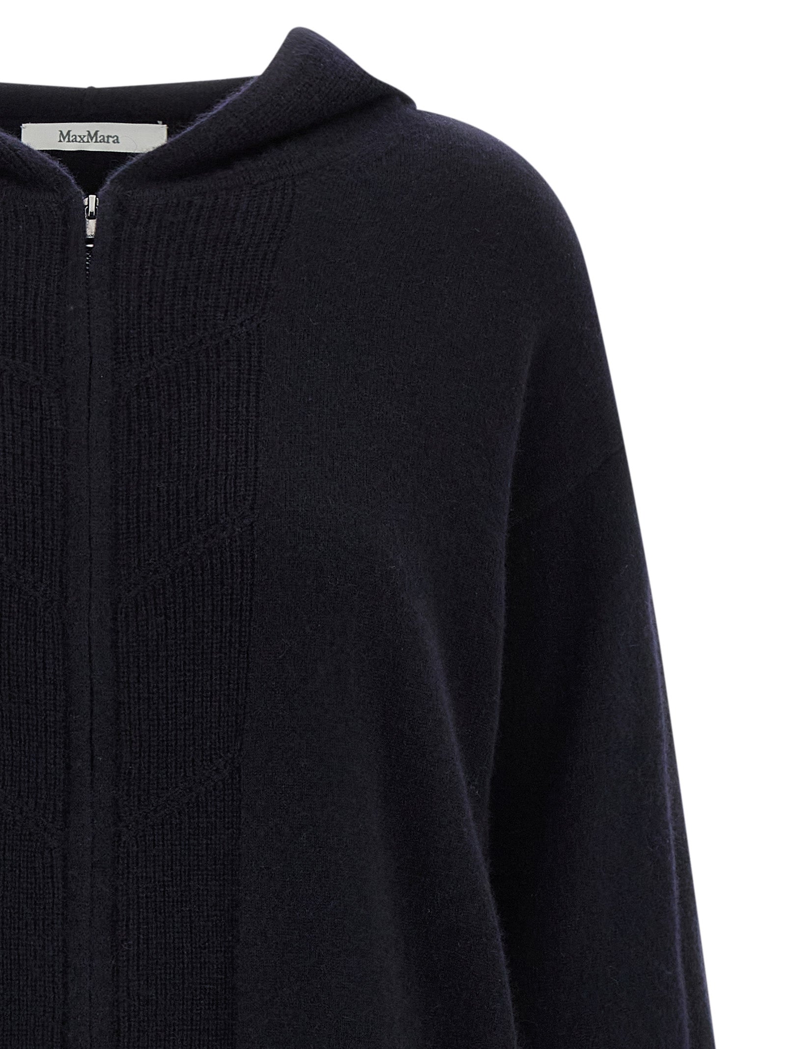 Indulge in the Max Mara Blue Cashmere Cardigan, a masterpiece of artisanal craftsmanship in pure cashmere, embodying timeless elegance and effortless sophistication.