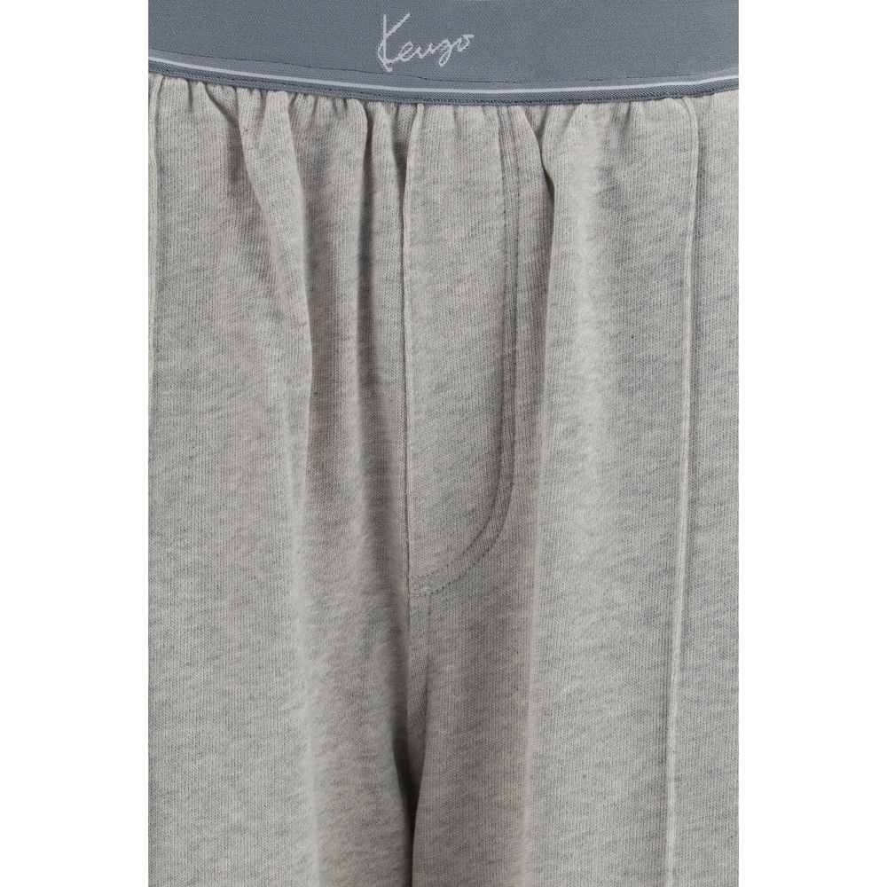 Experience the elegance of Kenzo Gray Cotton Joggers, crafted from luxurious 100% cotton, perfect for sophisticated leisure and effortless style in any season.